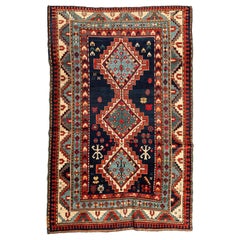 Antiker kaukasischer kastanienblauer Kazak-Teppich, ca. 1900-1910er Jahre