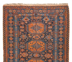 Antique Caucasian Orange and Navy Blue Geometric Tribal Soumak Rug, circa 1920s