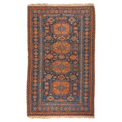 Tapis Soumak tribal géométrique caucasien ancien orange et bleu marine, vers les années 1920