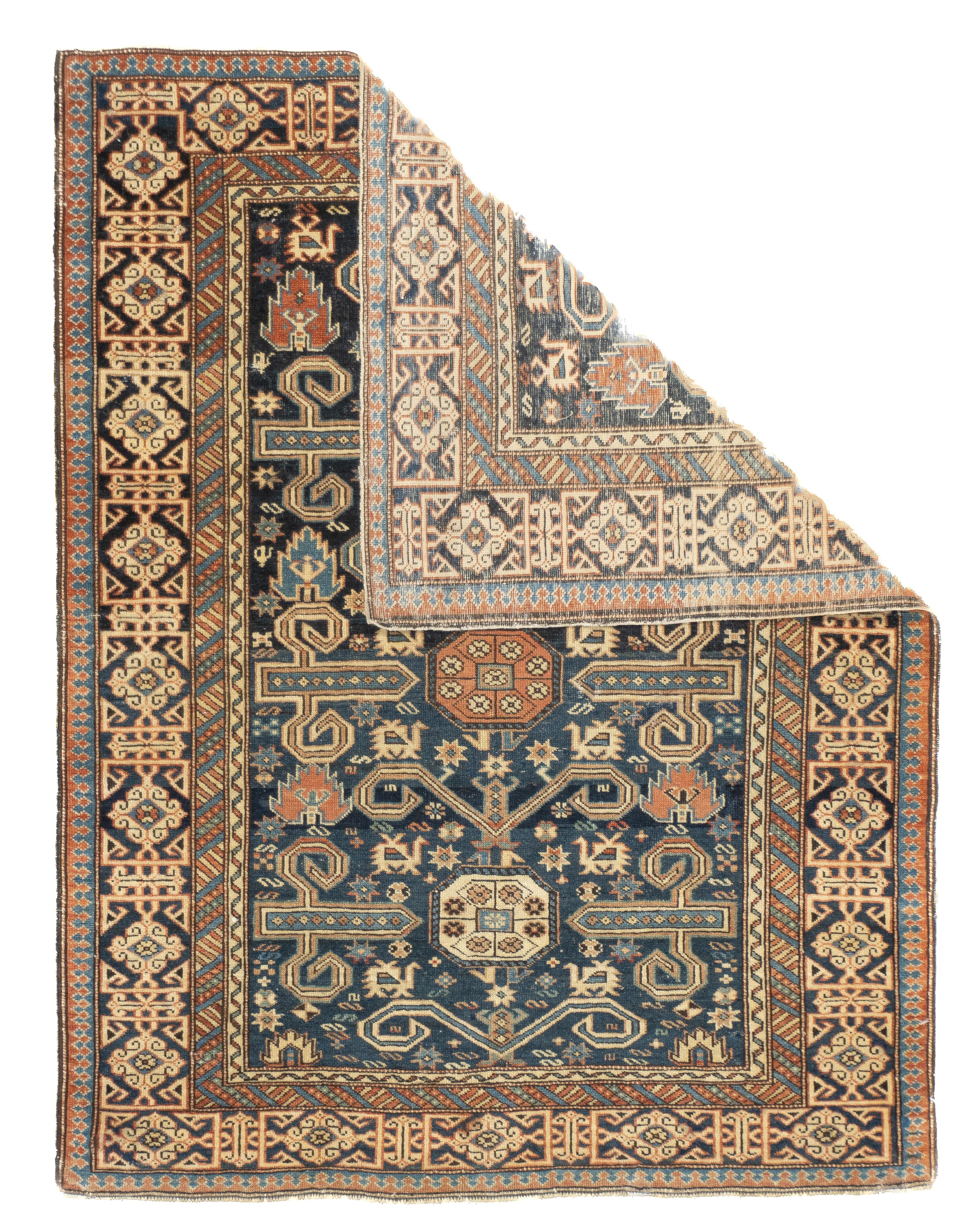Antique Caucasian Perpedil Rug 3'1'' x 3'11''. Generally in scatter sizes, from eastern Caucasus, all wool; geometric small scale patterns. A Kuba sub-type. Usually dark blue or cream grounds. A few prayer rugs. “Rams’ horn” major elements. Moderate