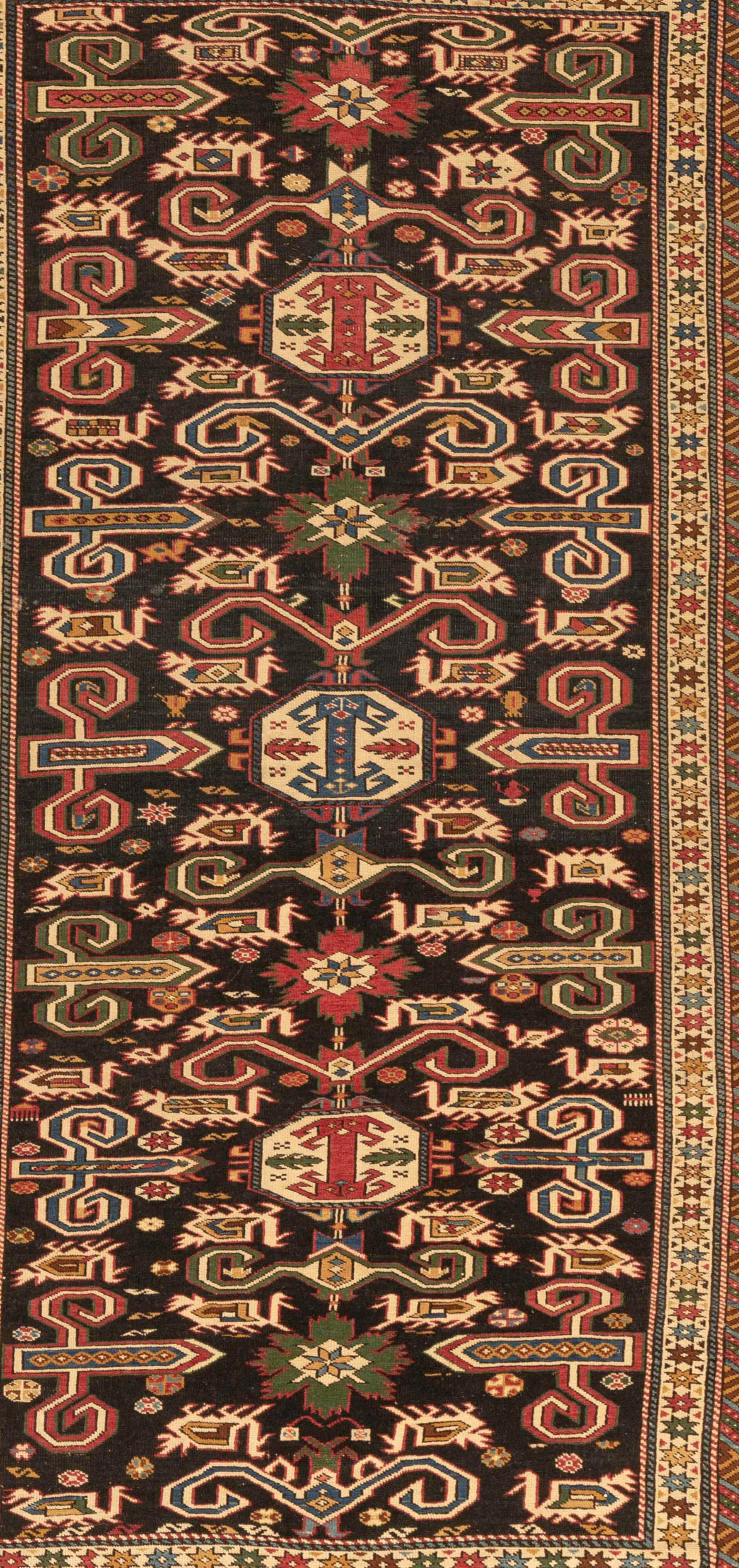 Antique Caucasian Perpedil Shirvan rug, circa 1880 from the town of the same name situated to the southeast of Kuba in the Caucasian region of Daghestan. Featuring the distinctive ram's Horn design associated with rugs from this area on a dark blue