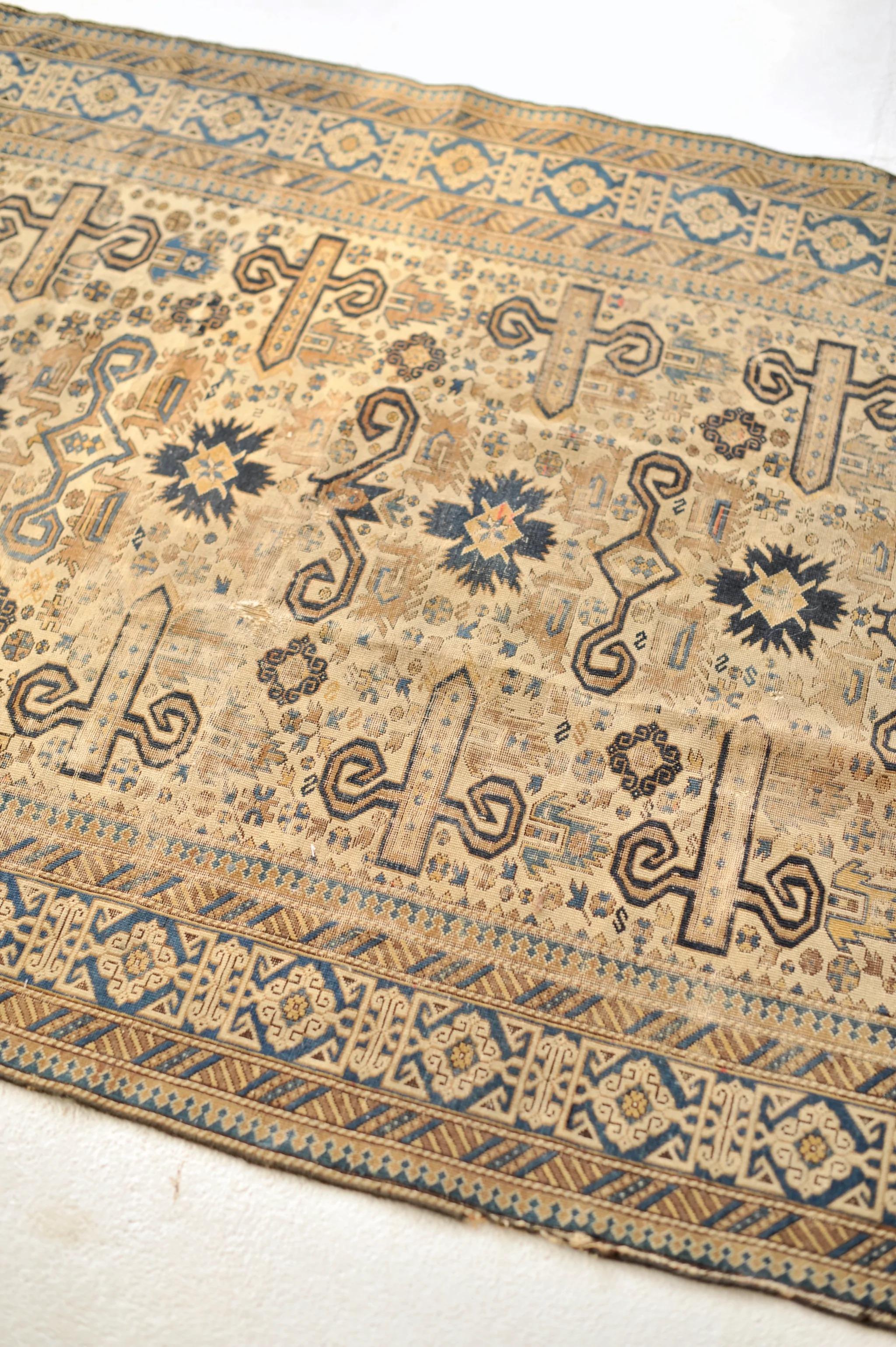 20th Century Antique Caucasian Prepidil Rug with Stylized Ram Horns in Beige & Navy For Sale