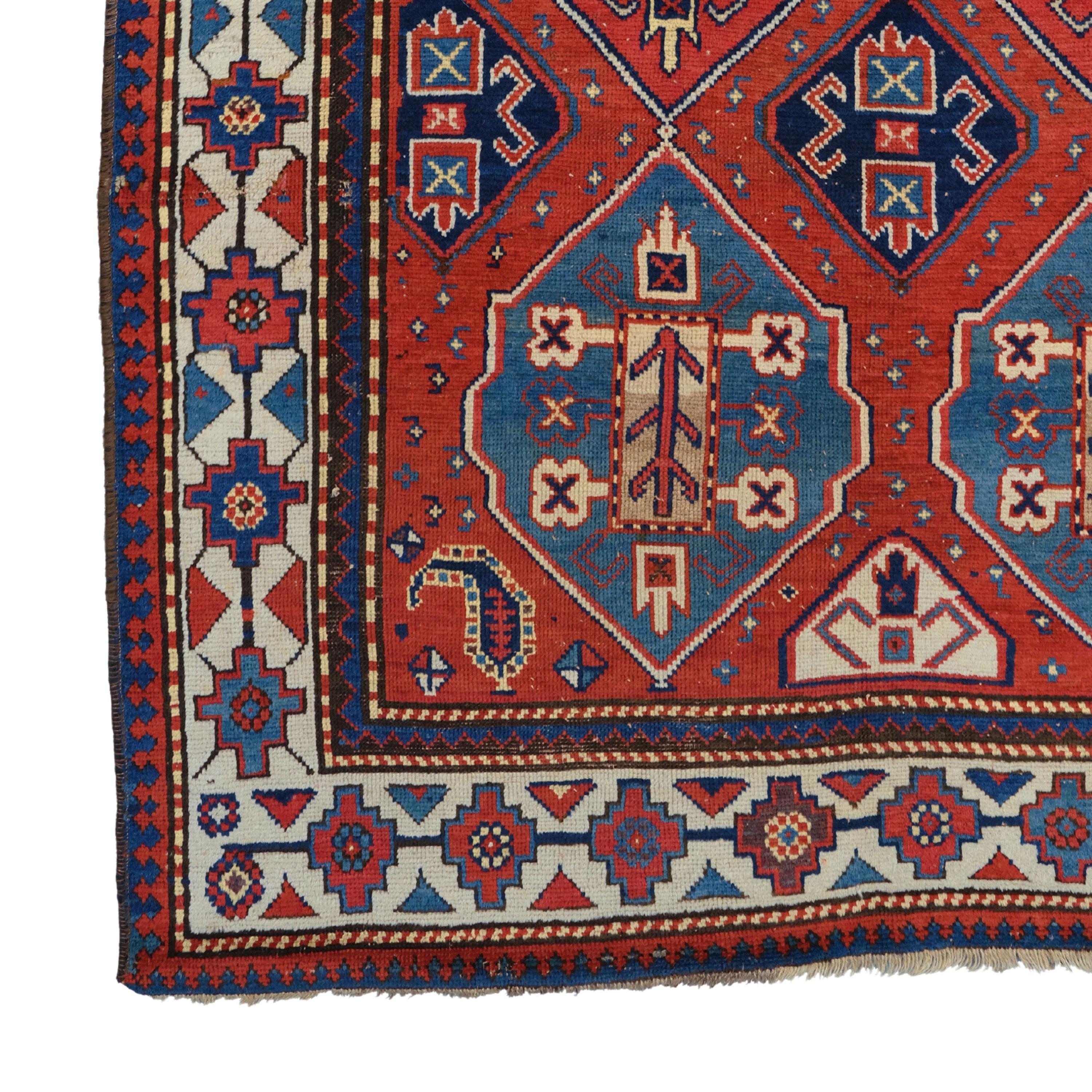 Antique Caucasian Rug
19th Century Antique Caucasian Rug
Size: 142x234 cm  7,90x7,67 Ft

This 19th-century Caucasian rug adds nobility to any space with its historical beauty and artistic value. The rich color palette and detailed patterns are