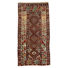 Tapis caucasien ancien de 2,58 m x 1,25 m
