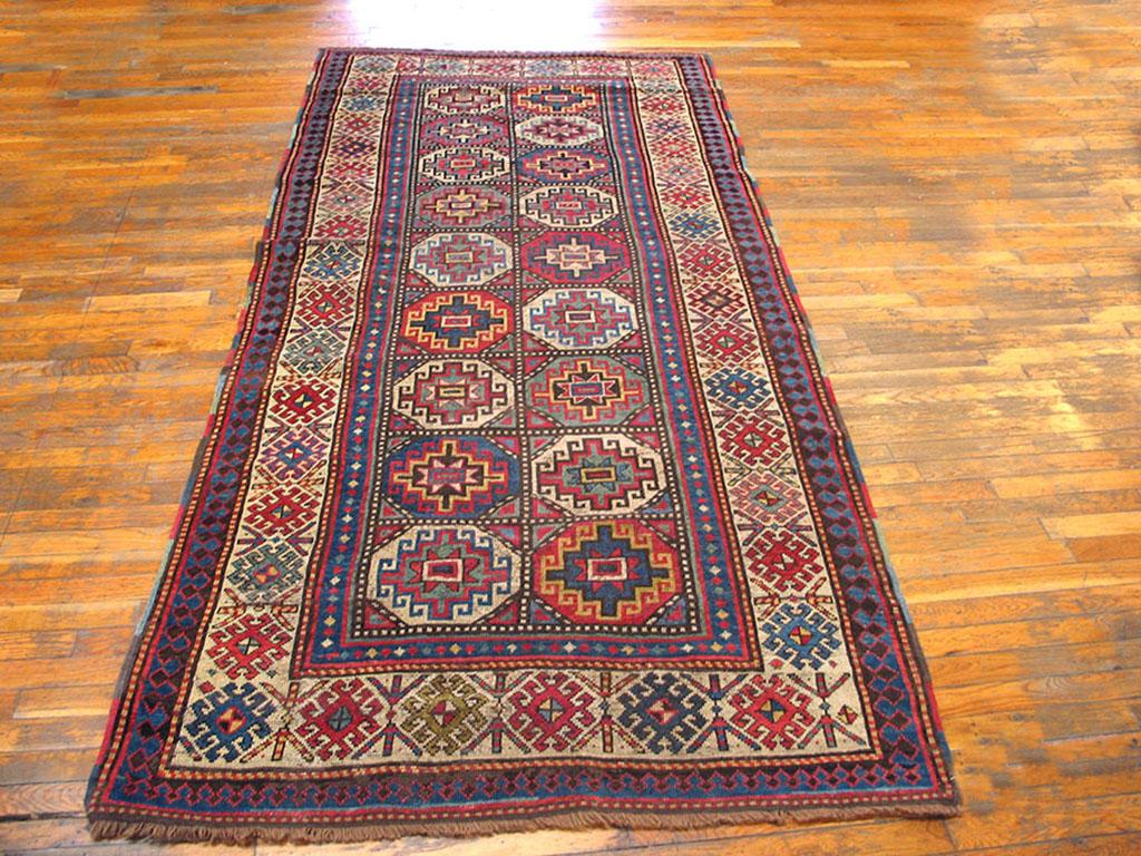 Hand-Knotted Early 20th Century Caucasian Kazak Carpet ( 4' x 9' - 122 x 274 ) For Sale