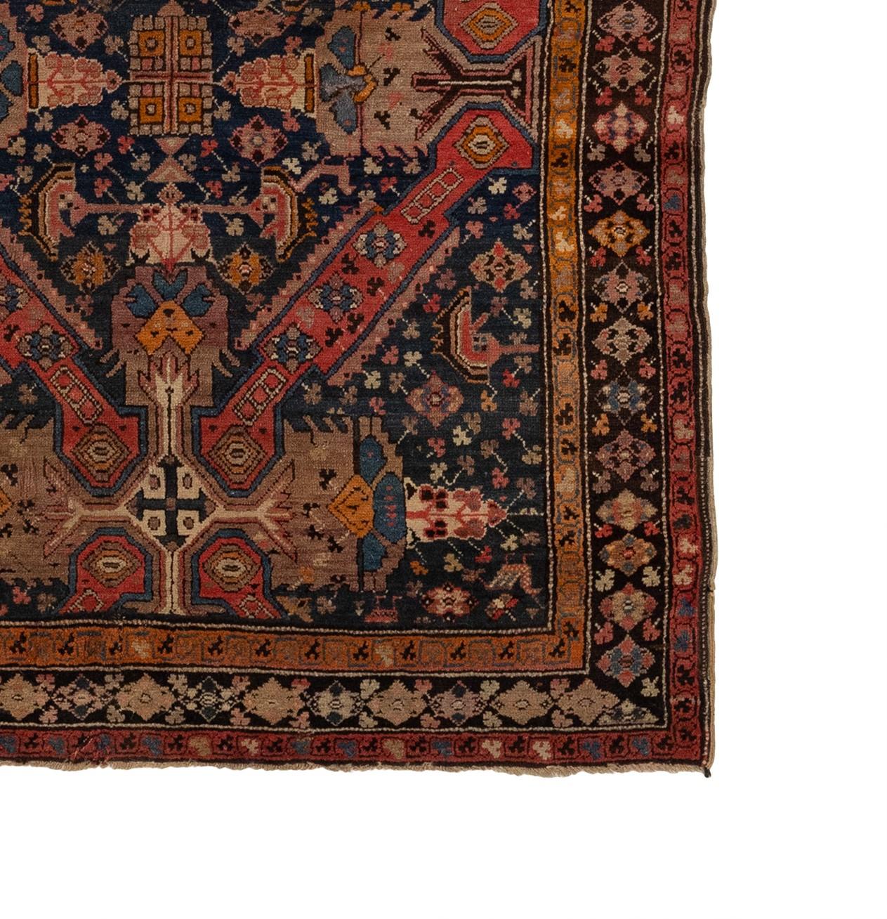 This antique Caucasian rug from the 1880s features a breathtaking dragon design. The intricate patterns and flawless craftsmanship showcase the incredible talent and creativity that went into its creation. Its timeless elegance and exquisite design