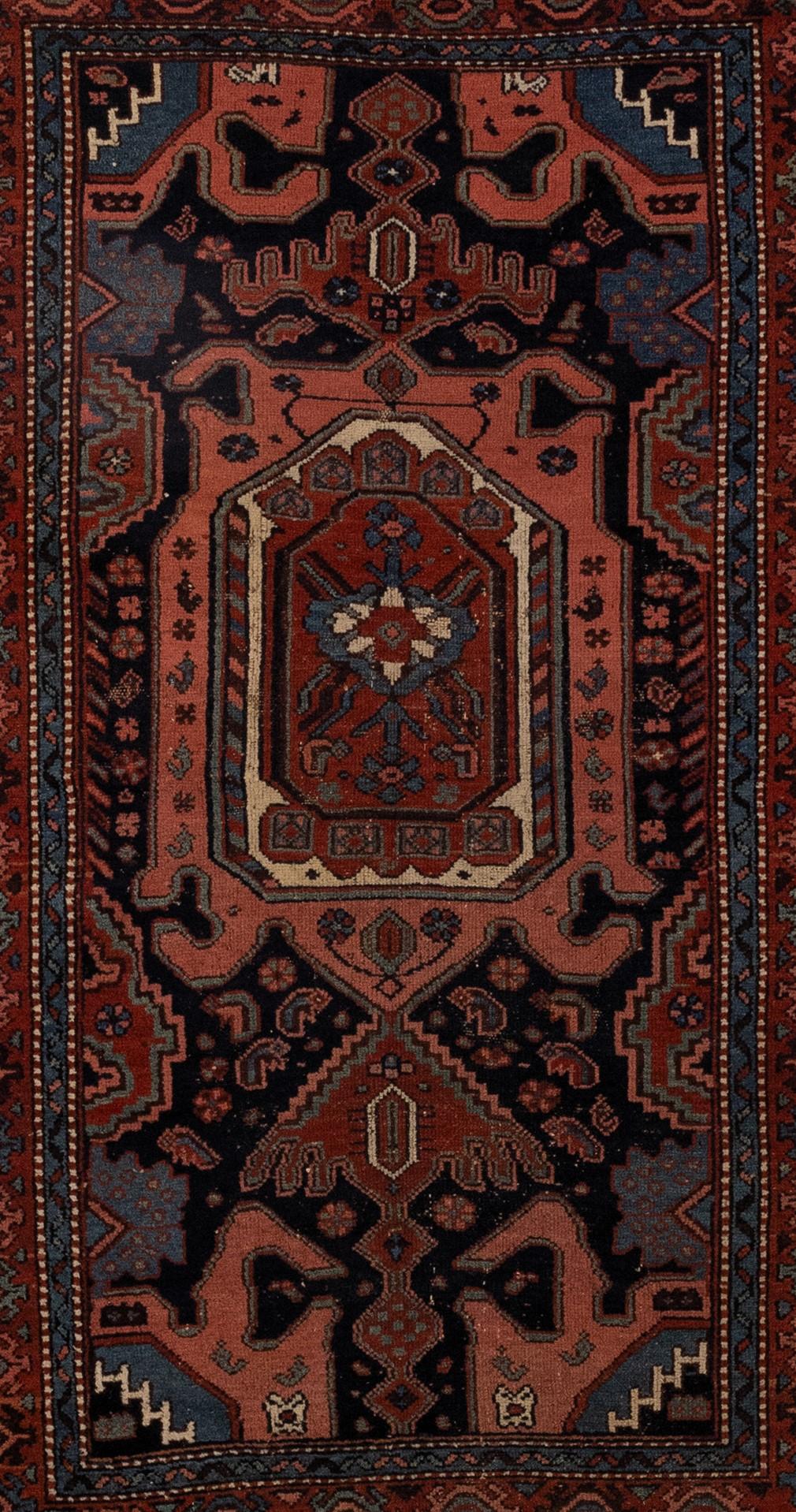 
This stunning antique rug from the Caucasus region is a true masterpiece that represents the area's rich cultural heritage and artistic traditions. Its intricate patterns and motifs are the result of skilled weavers who used traditional techniques