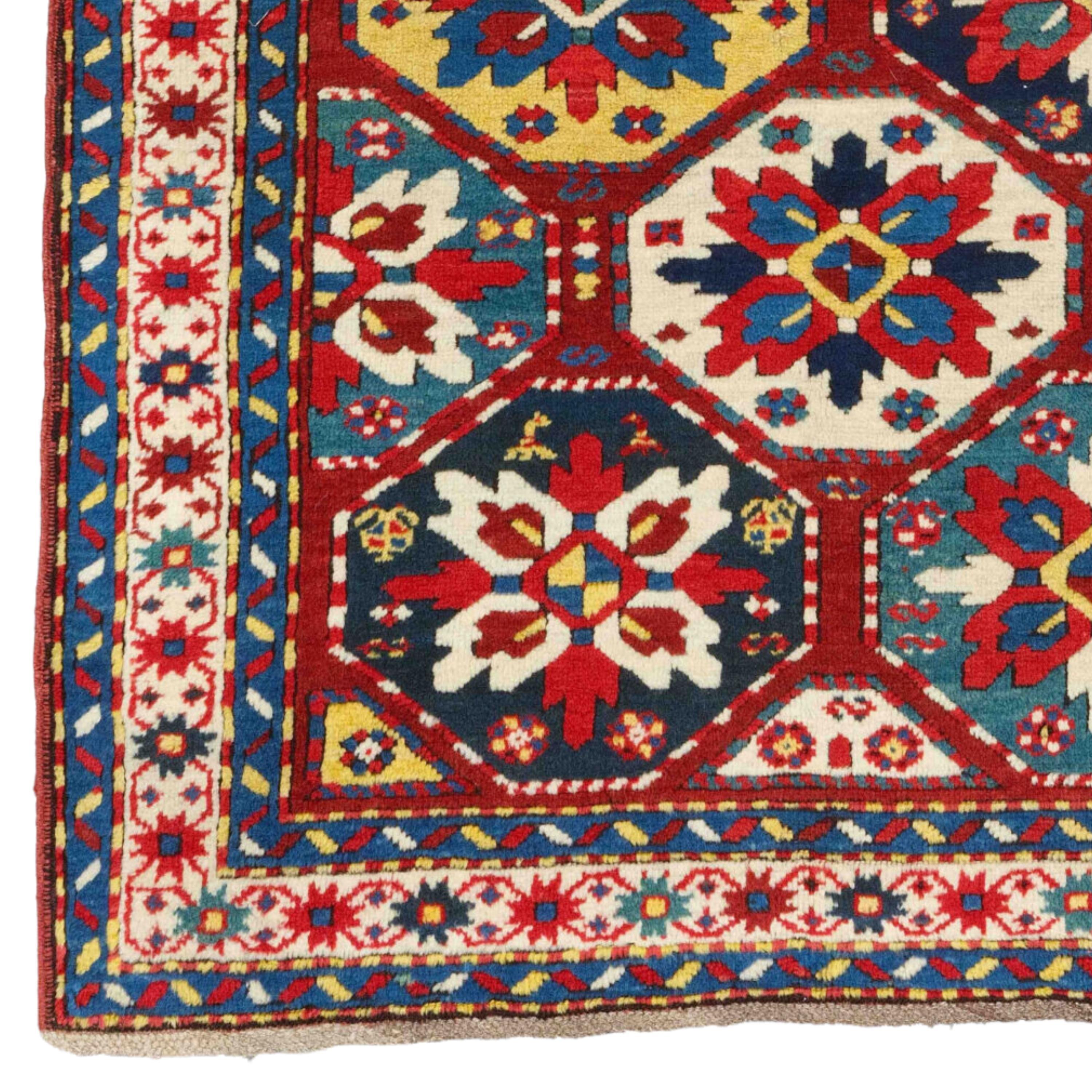 Middle of 19th Century Eagle Group Caucasian Rug
Size 115 x 195 cm (3,77 - 6,39 ft)

This magnificent carpet is a rare and highly sought-after Eagle Group Caucasian carpet woven in the Karabakh region in the mid-19th century. At the center of the
