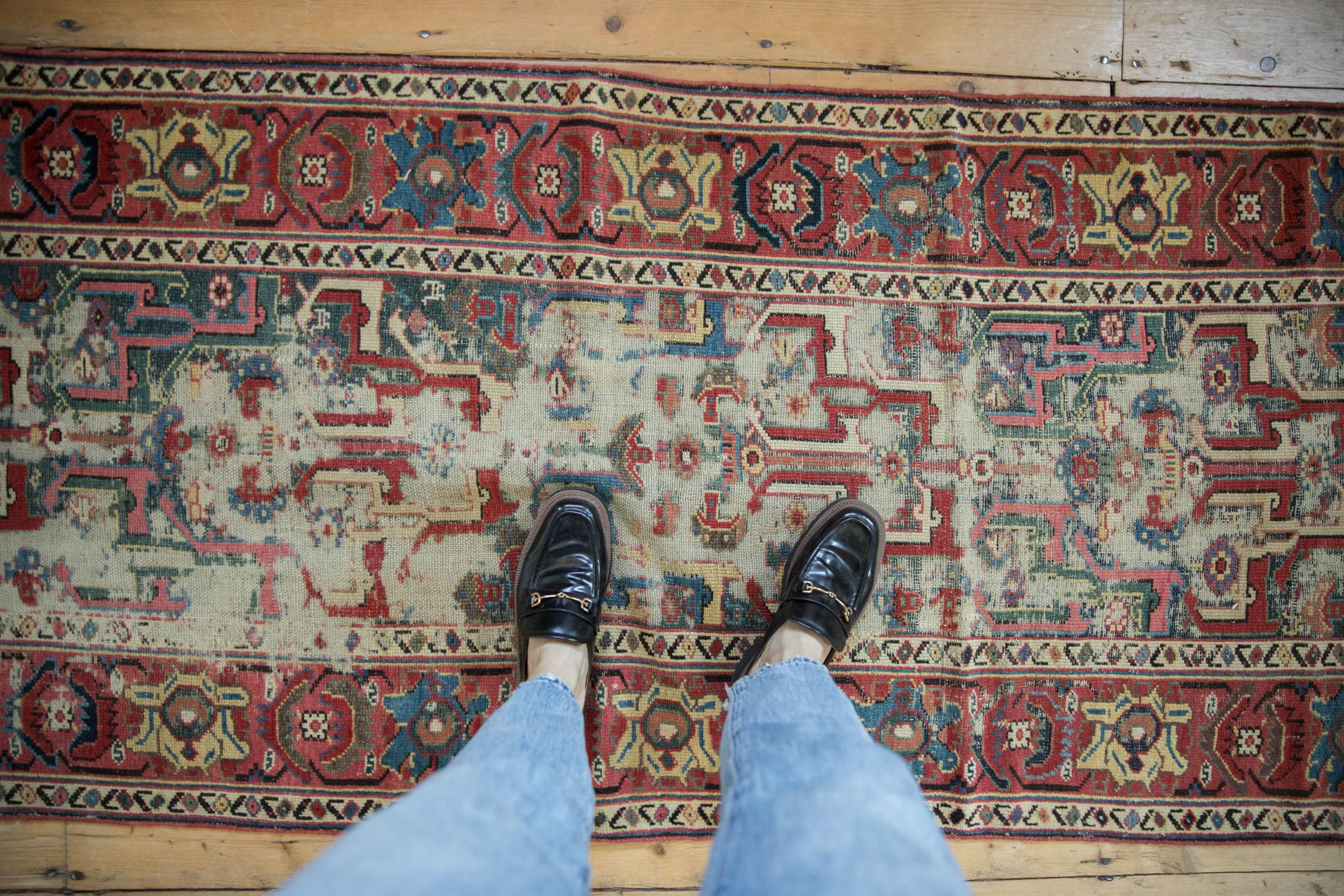 :: Covered field of geometric arabesques wrapped by floral cross-section and partial Herati main border. An unusual design motif in a somewhat early example. Colors and shades include: Raspberry red, dusty teal, sky blue, sapphire blue, ruby red