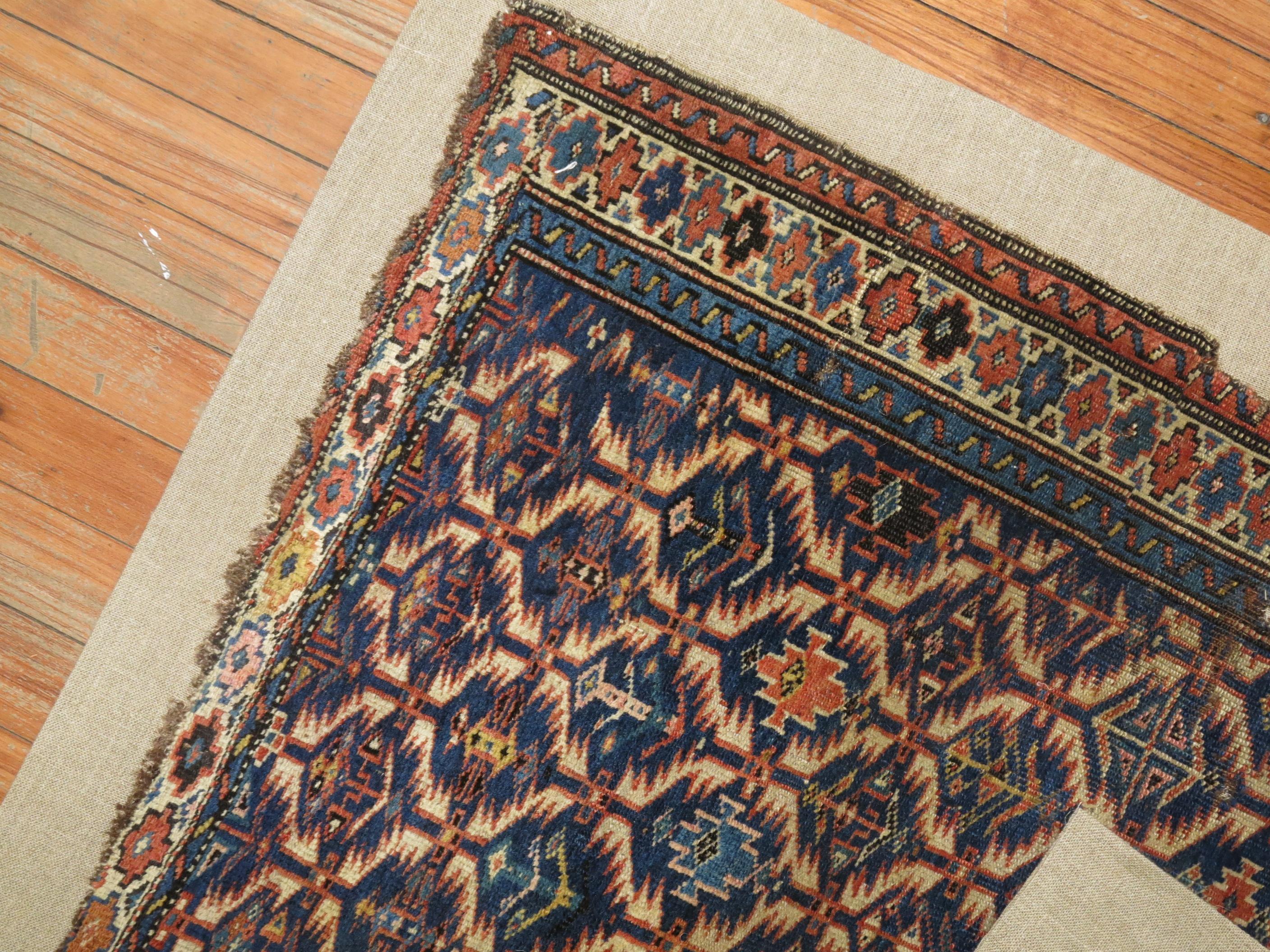 A mid-19th century Caucasian Kuba rug hand stitched onto a canvas like Linen Fabric. This item can either be used as a wall piece or floor covering. It can be walked on if desired.