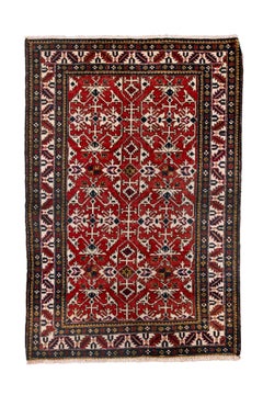 Antique Caucasian Rug with Latch-Hook Medallions and Floral Devices