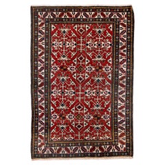 Antique Caucasian Rug with Latch-Hook Medallions and Floral Devices Antique Caucasian Rug with Latch-Hook Medallions and Floral Devices