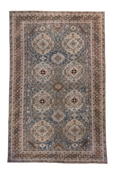 Antique Caucasian Rug with Soft Blue & Camel Medallions.