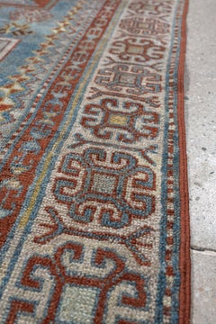 Antique Caucasian Rug with Star Medallions on Sky Blue Field, circa 1910s
