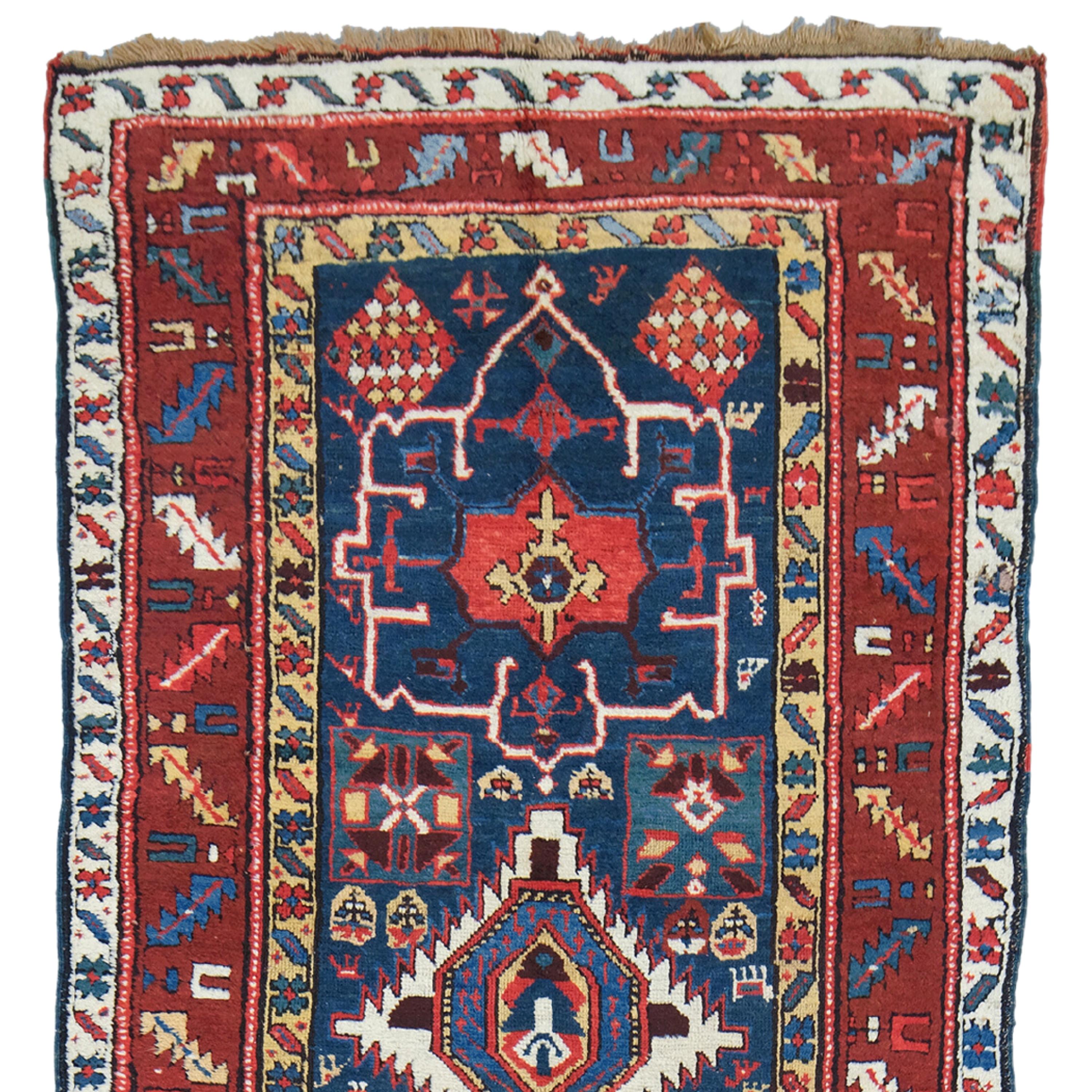 19th Century Caucasus Runner, Handmade Wool Runner

This elegant antique Caucasian runner brings the elegance and craftsmanship of the 19th century to the present day. Knitted from high quality materials, this rare piece has the beauty and charm to