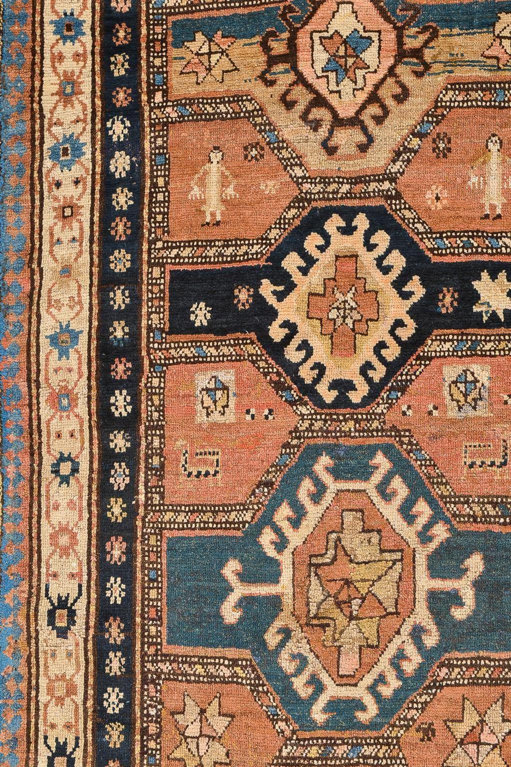 Antique soft runner, light blue colors on camel hair, beautiful to look and enjoy, maybe in front of a library or on wall: to admire . The photographs do not reflect the beauty of the colors. It's one of the most beautiful runners  I have seen.
 The