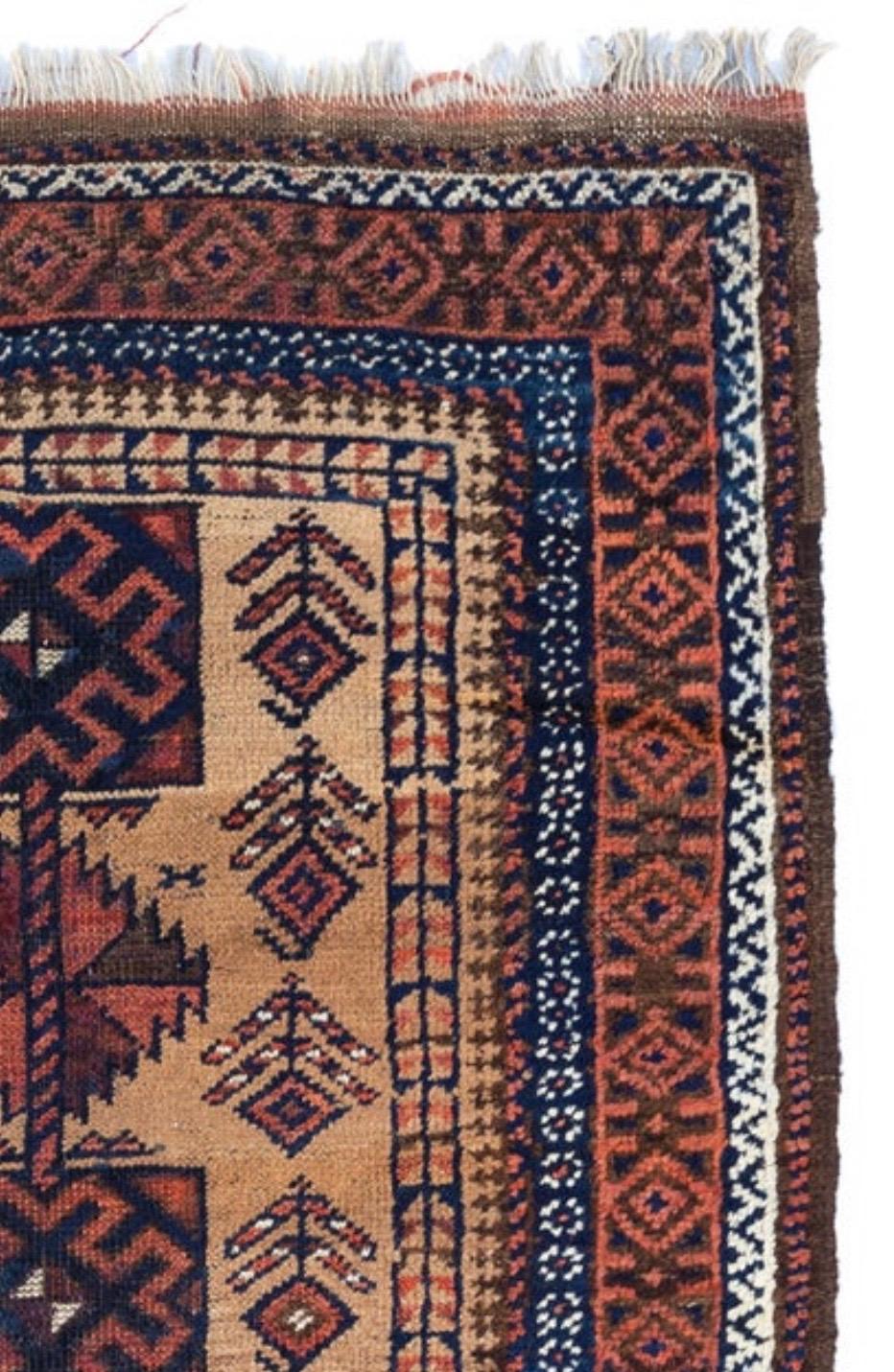 Hand-Woven Caucasian Rust Navy Blue Brown Tan Geometric Tribal Baluch Rug, circa 1930s For Sale