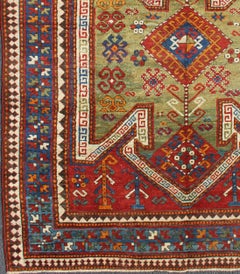 Antique Caucasian Sewan Kazak Rug with Large-Scale Tribal Design in Red & Green