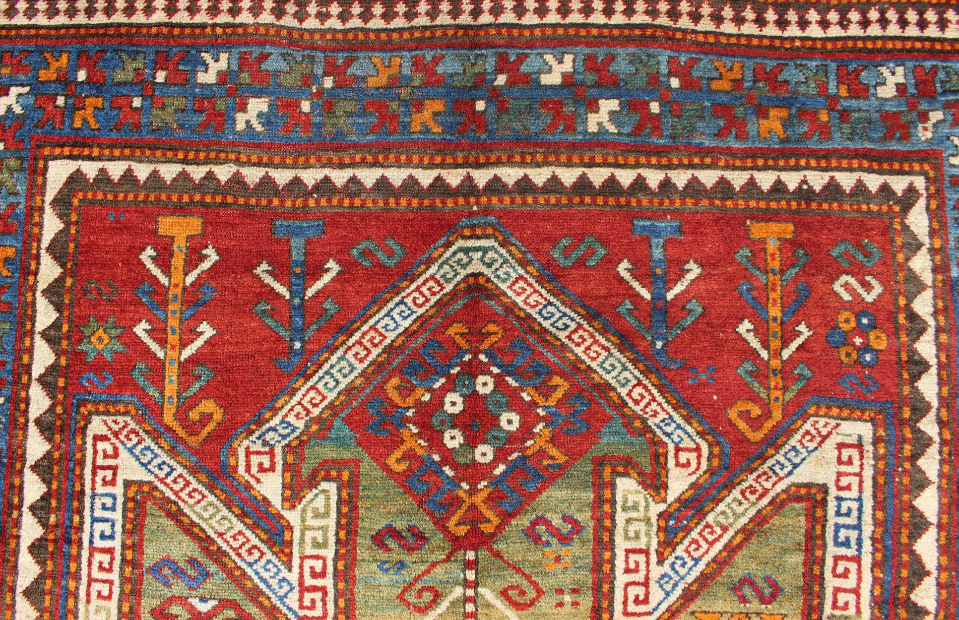 Late 19th Century Antique Caucasian Sewan Kazak Rug with Large-Scale Tribal Design in Red & Green For Sale