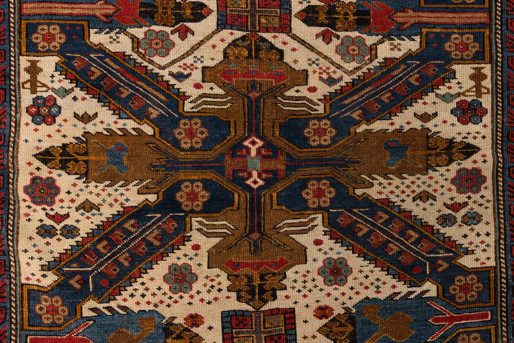 Seychour – Kuba, Northeast Caucasus

The tradition of Seichour rugs from Kuba features a variety of visual formats, the most emblematic design being the compressed cross of Saint Andrew. In this rug, a series of this motif is lined up among the