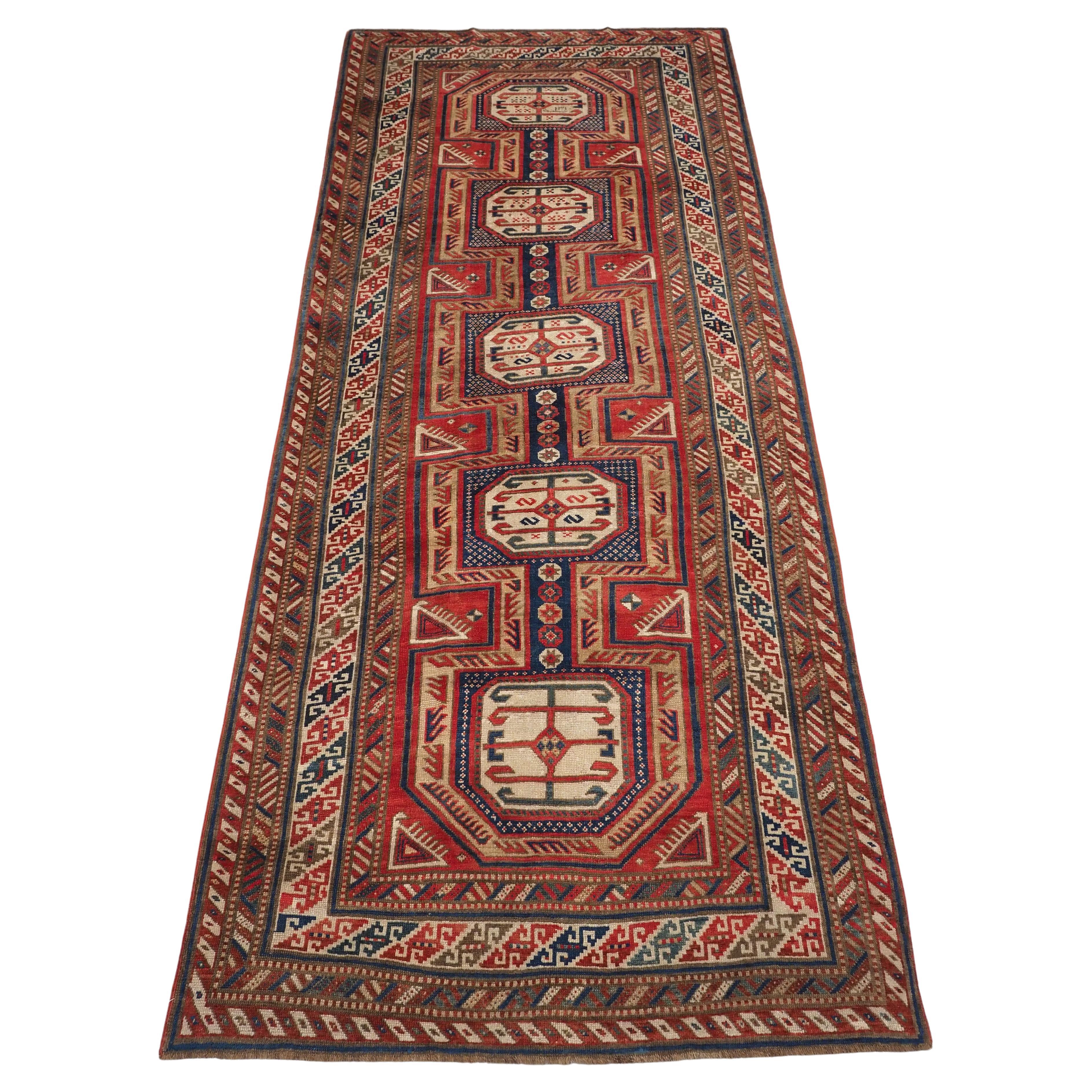 Antique Caucasian Shirvan Baku long rug with 'Surahani' garden design, 1892. For Sale