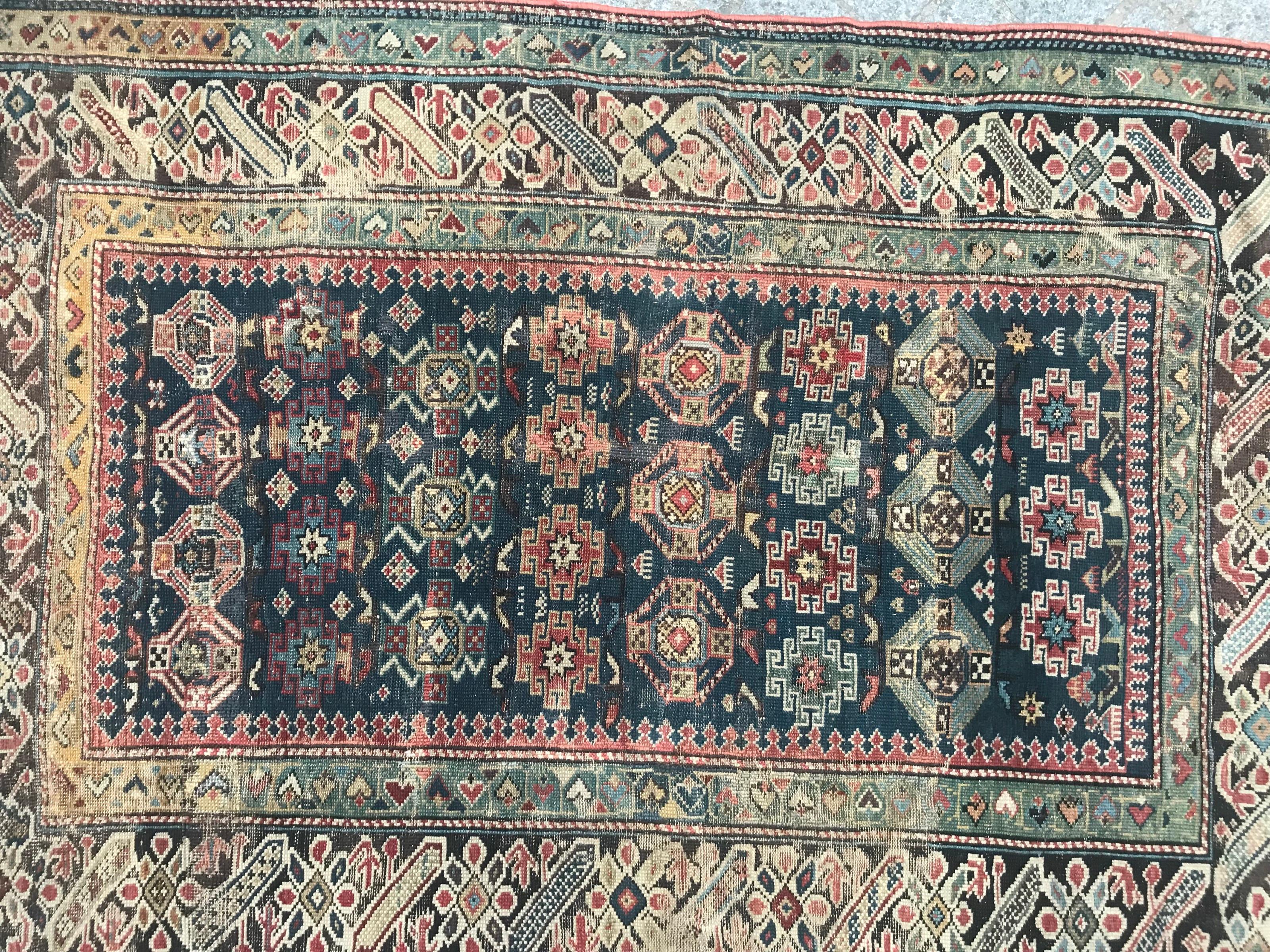 Beautiful fine shirvan Chichi of Caucasus late 19th century with a geometrical design and beautiful natural colors with blue, green, pink yellow and purple, entirely and finely hand knotted with wool velvet on wool foundation.