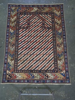 Antique Caucasian Shirvan/Dagestan prayer rug with scarce diagonal stipe design.