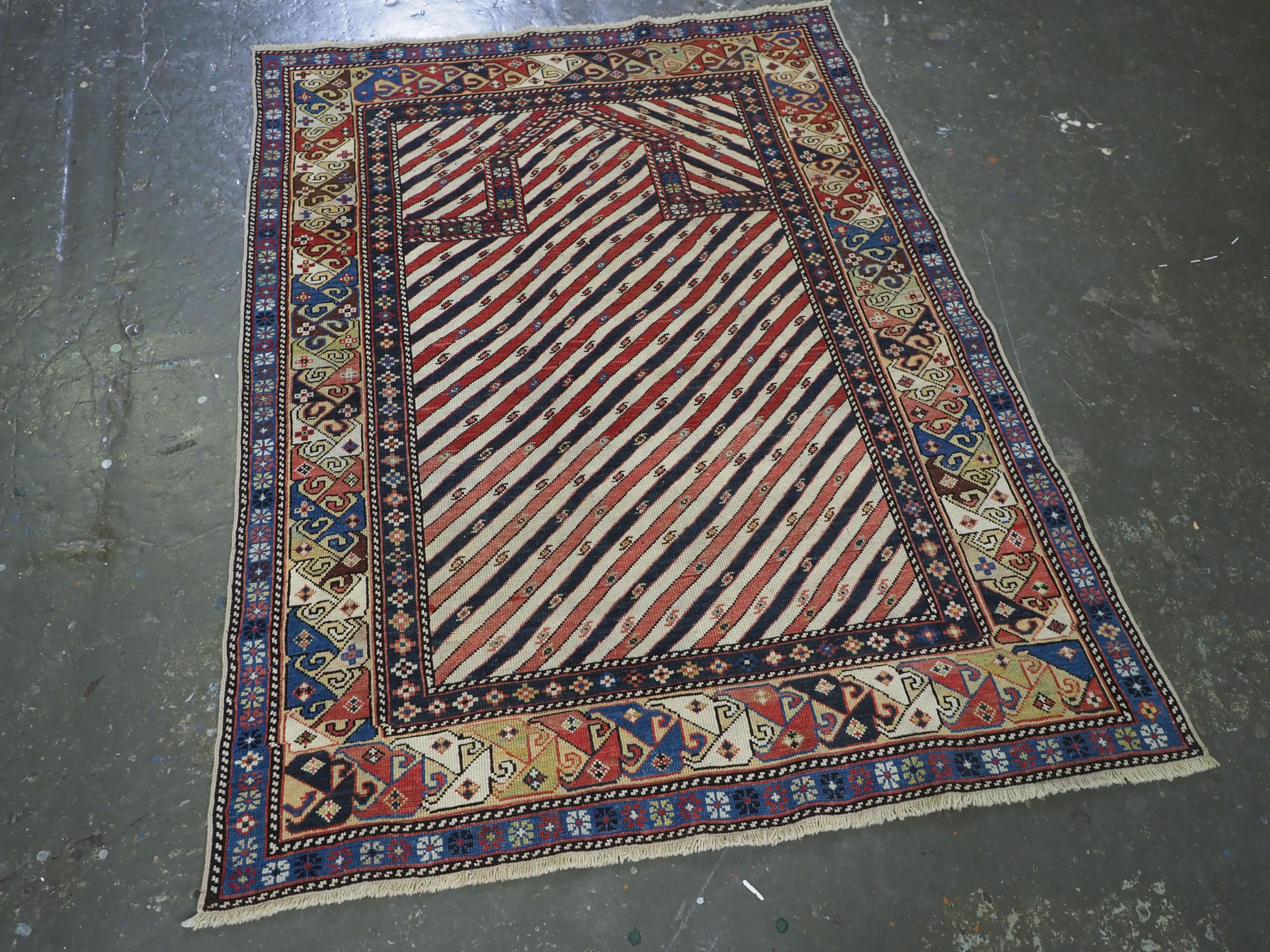 Wool Antique Caucasian Shirvan/Dagestan prayer rug with scarce diagonal stipe design. For Sale