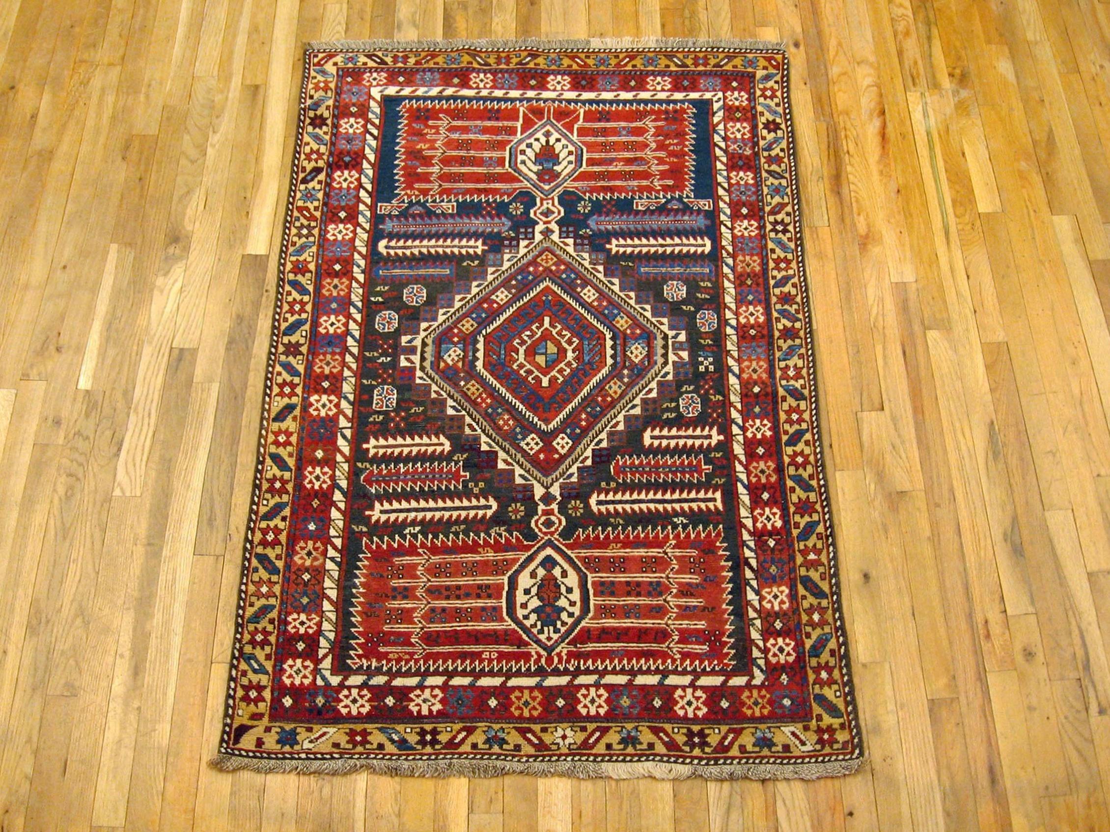 Antique Caucasian Shirvan rug, small size, circa 1900.

A one-of-a-kind antique Caucasian Shirvan Oriental Carpet, hand-knotted with soft wool pile. This lovely hand-knotted wool rug features a central medallion on the brown primary field, with an