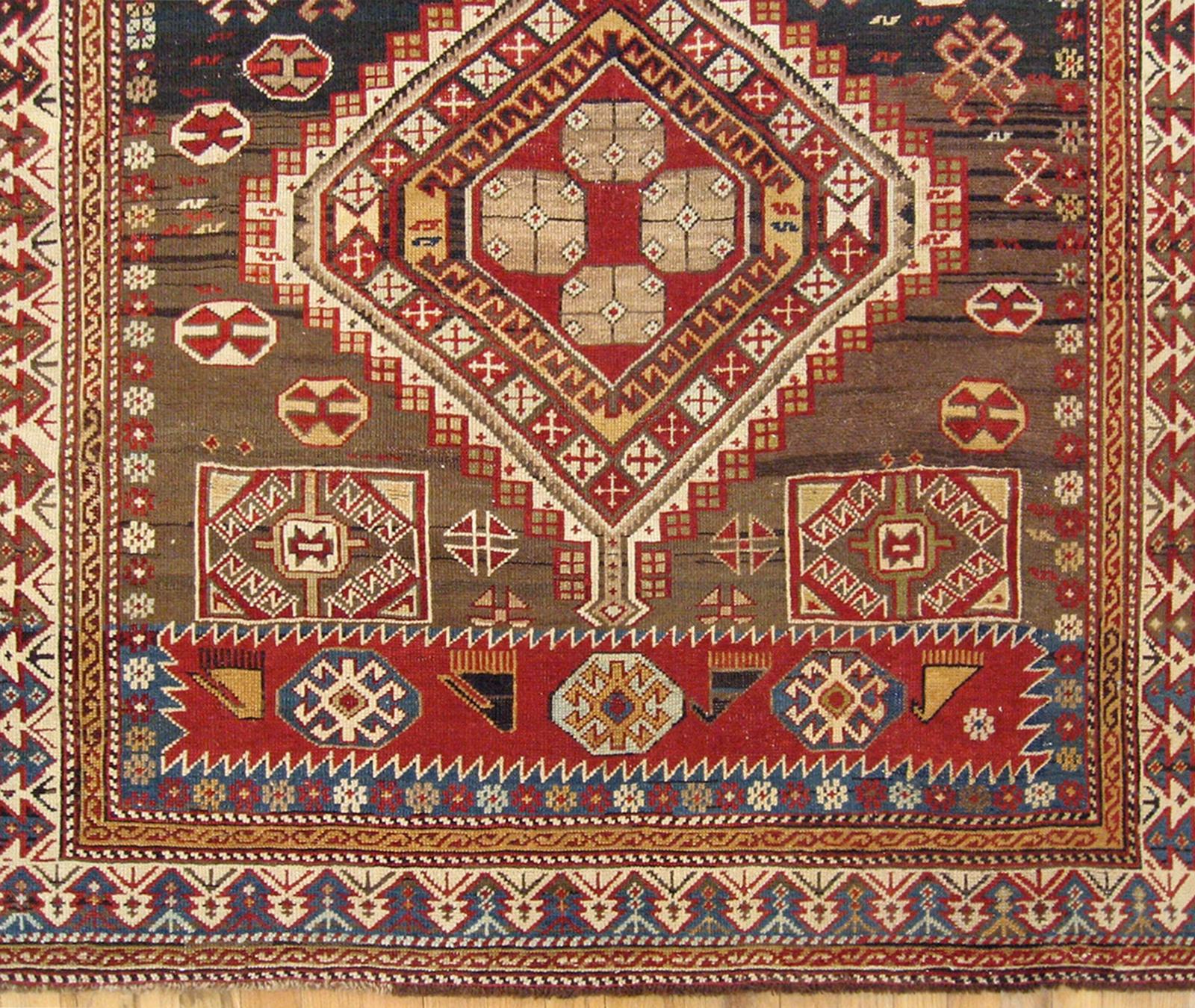 Hand-Knotted Antique Caucasian Shirvan Oriental Rug in Small Size with Multiple Medallions For Sale