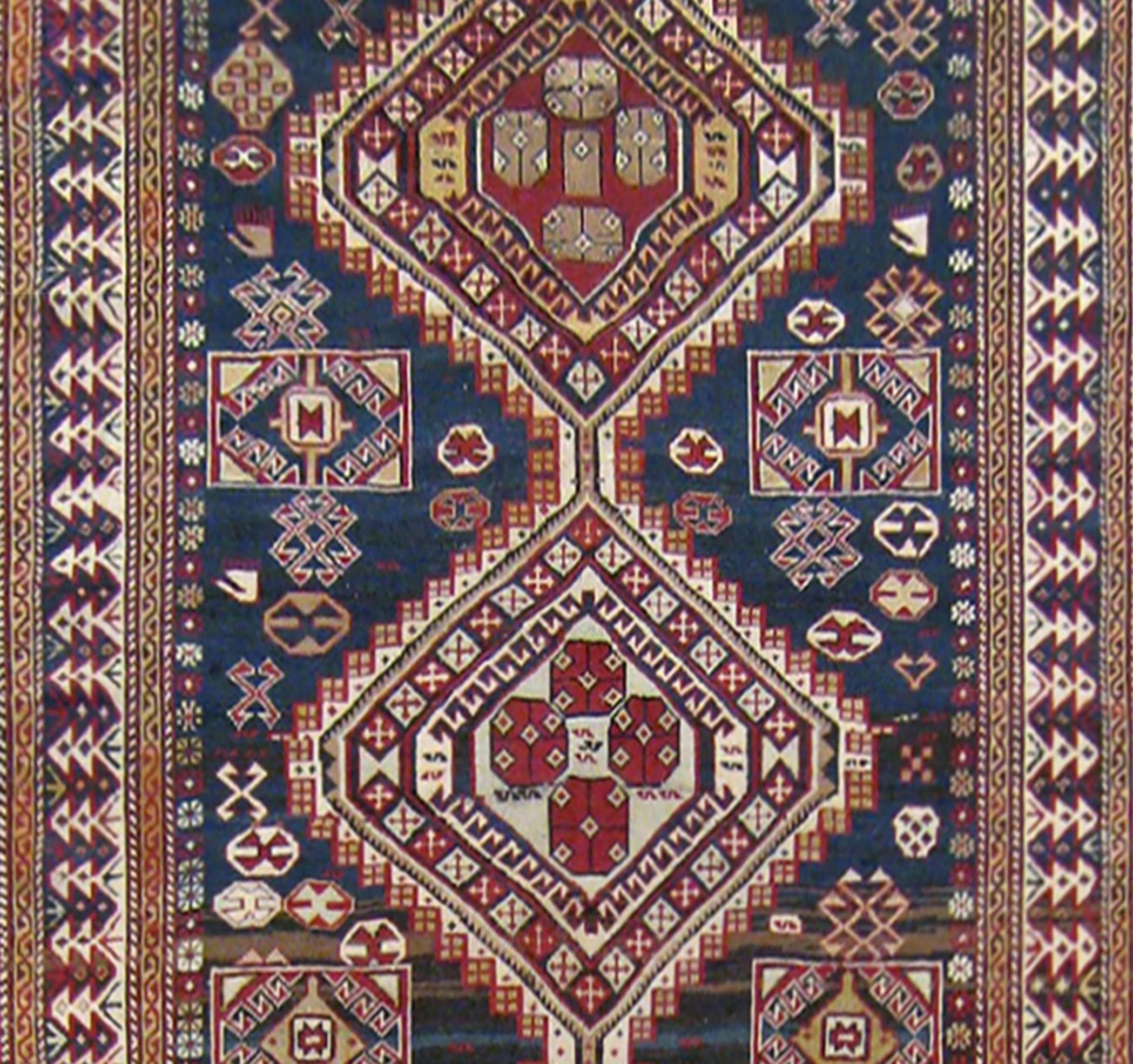 Antique Caucasian Shirvan Oriental Rug in Small Size with Multiple Medallions In Good Condition For Sale In New York, NY