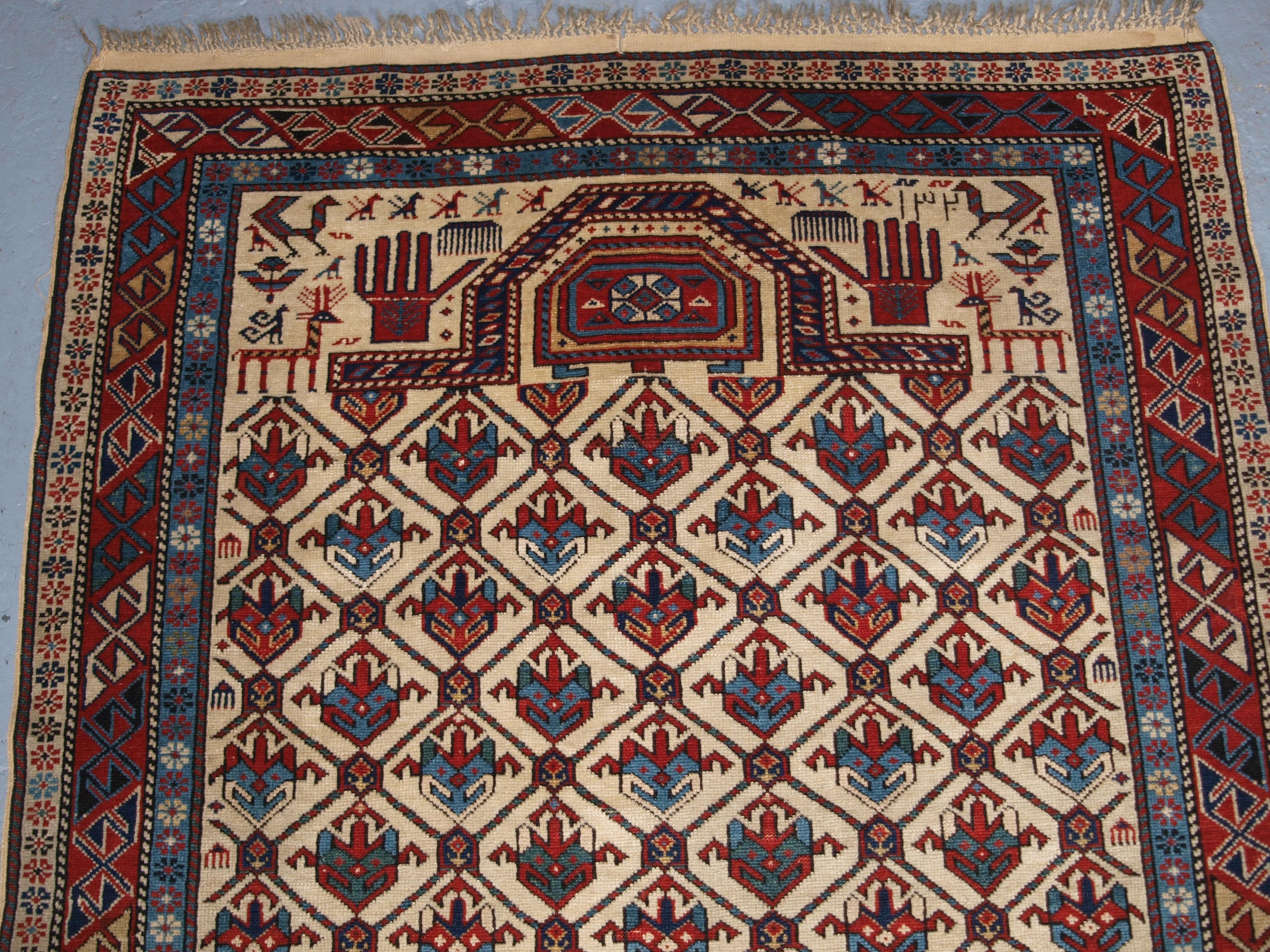 Antique Caucasian Shirvan prayer rug with lattice design on an ivory ground. Dated 1320 (1902 in the western calendar). This is a superb example of this well known group of prayer rugs, this rug has excellent colour and is very well drawn. This very