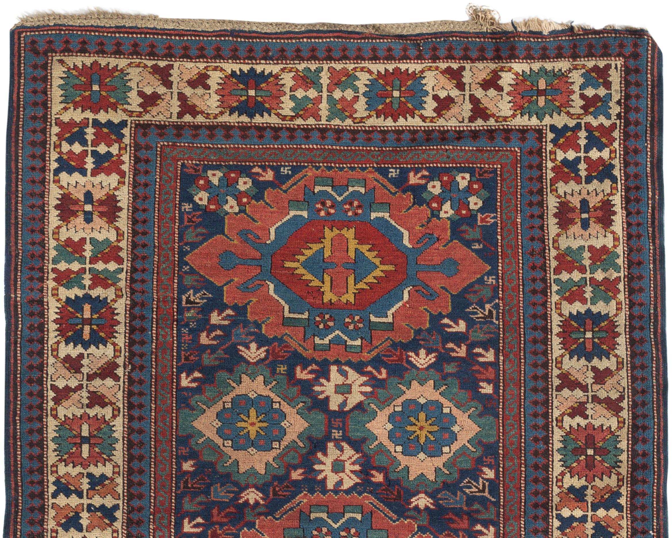 Antique Caucasian Shirvan rug, circa 1880. These types of antique Caucasian rugs were woven in the eastern part of the region, mostly along the west coast of the Caspian sea and show in the design, the ethnic style associated with Caucasian pieces.