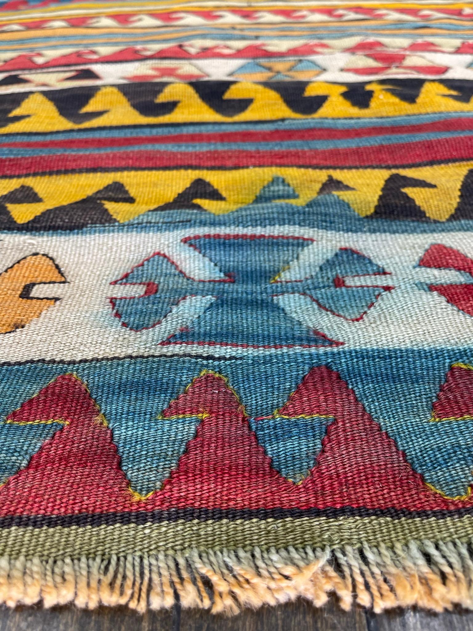 This rug is hand woven in the Shirvan district of Caucasus mountains region. The tiny very rare Shirvan is a fine example of the very best weaving of the shirvan region. The intricate detail and totemic symbols combine with the superb vegetable dues