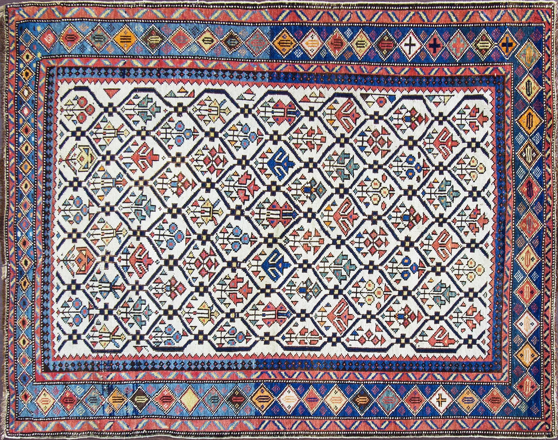 All colors on ivory background Shirvan rug dated circa 1880s.
The historic Khanate or administrative district of Shirvan produced many highly decorative antique rugs that have a formality and stylistic complexity that is found in few rugs from the