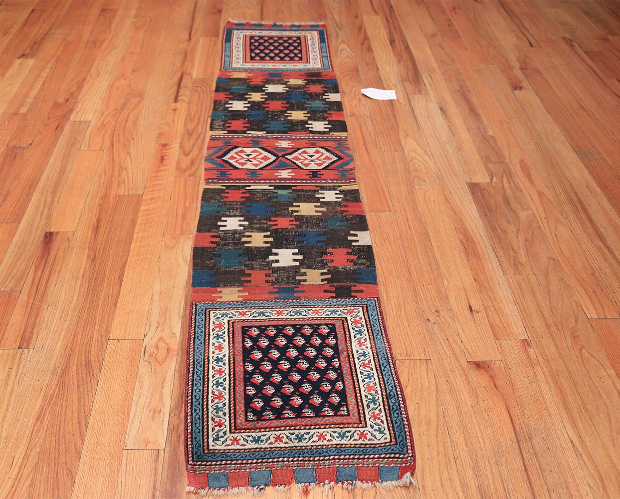 Antique Caucasian Shirvan rug, origin: Caucasus, circa late 19th century. Size: 1 ft 7 in x 7 ft 8 in (0.48 m x 2.34 m)

This enrapturing antique Shirvan rug showcases a beautifully varied and complex composition that incorporates an iconic