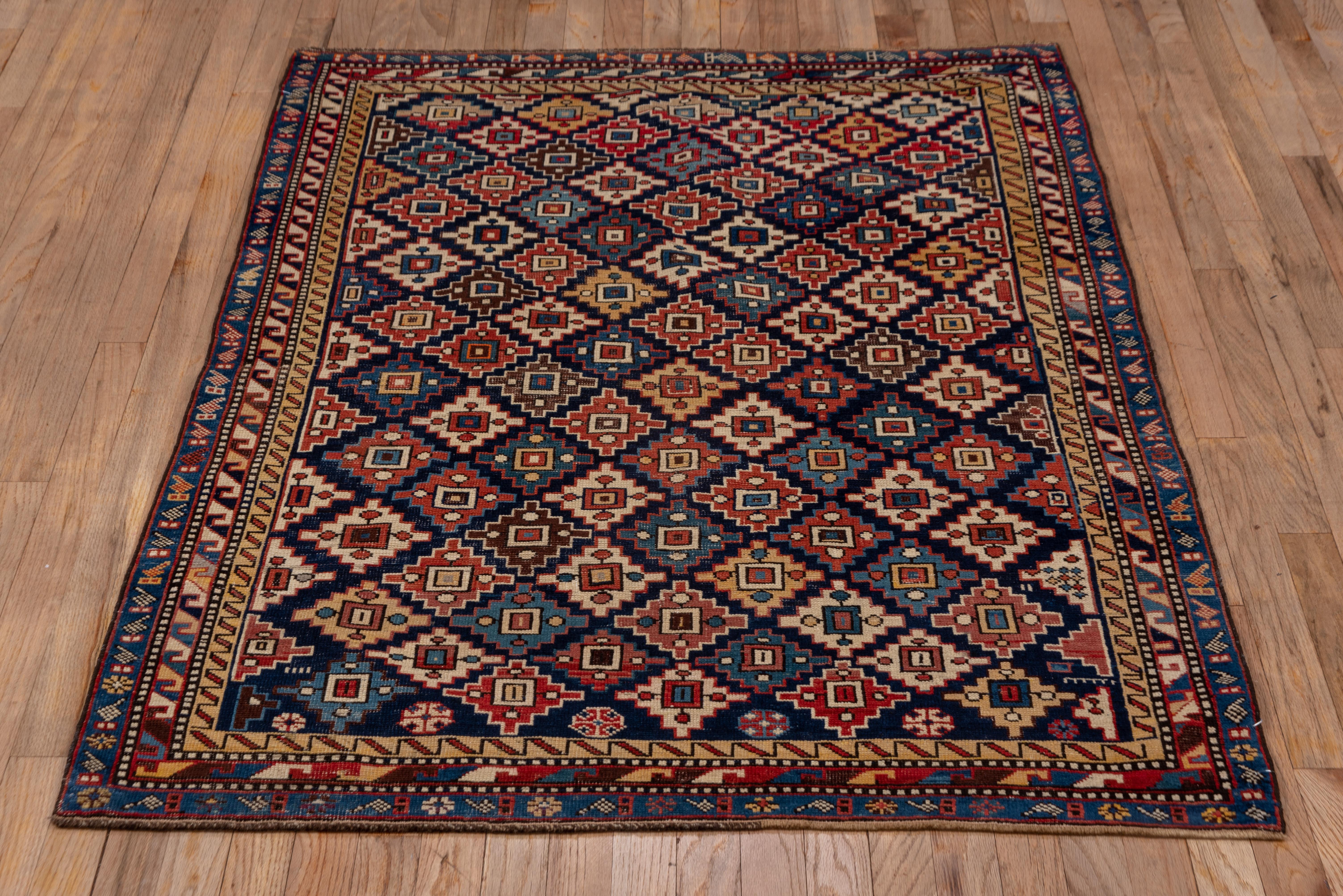Hand-Knotted Antique Caucasian Shirvan Rug, Geometric Field, Red, Navy & Yellow Palette