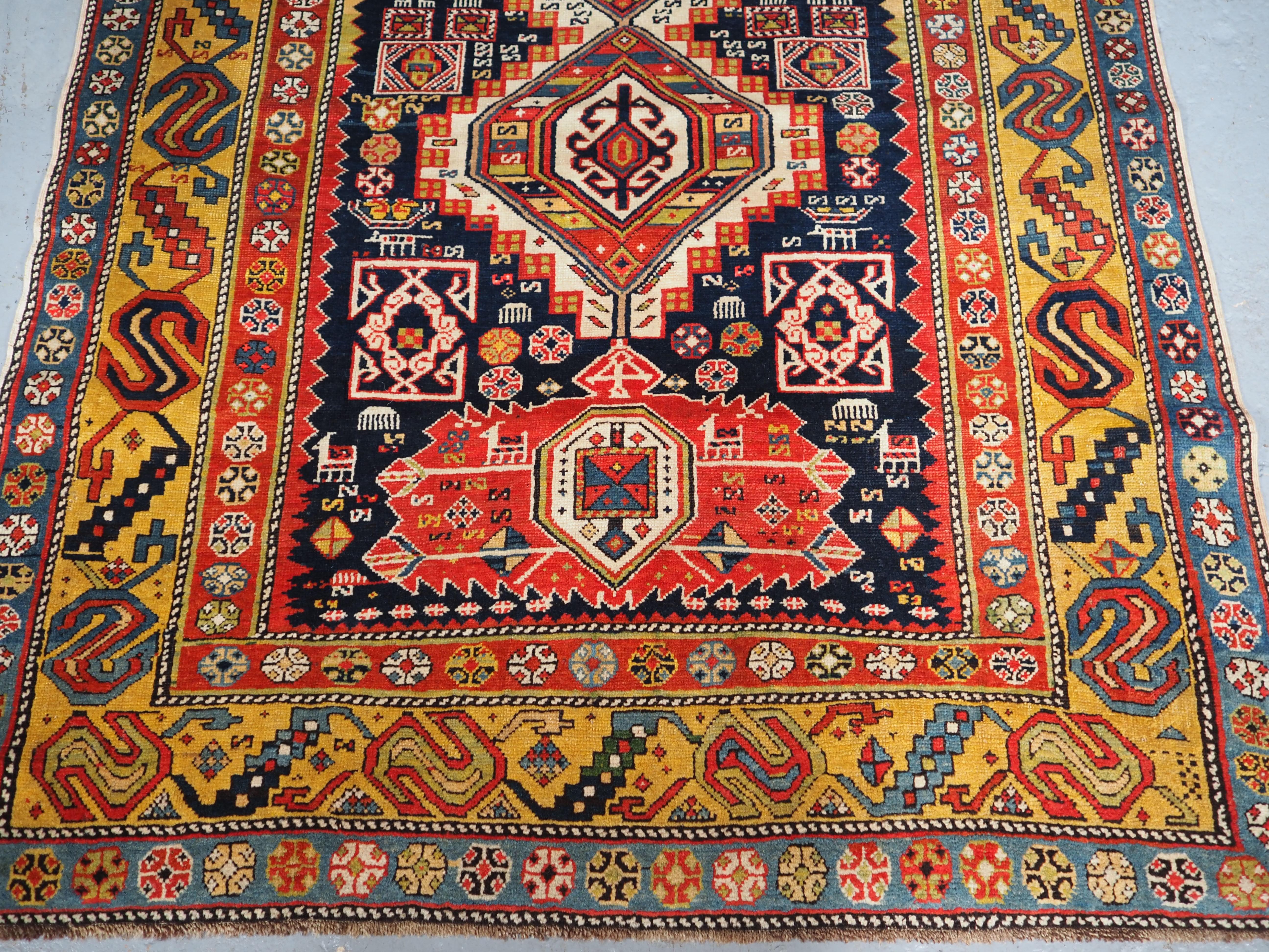 Hand-Woven Antique Caucasian Shirvan Rug of Classic Linked Medallion Design For Sale