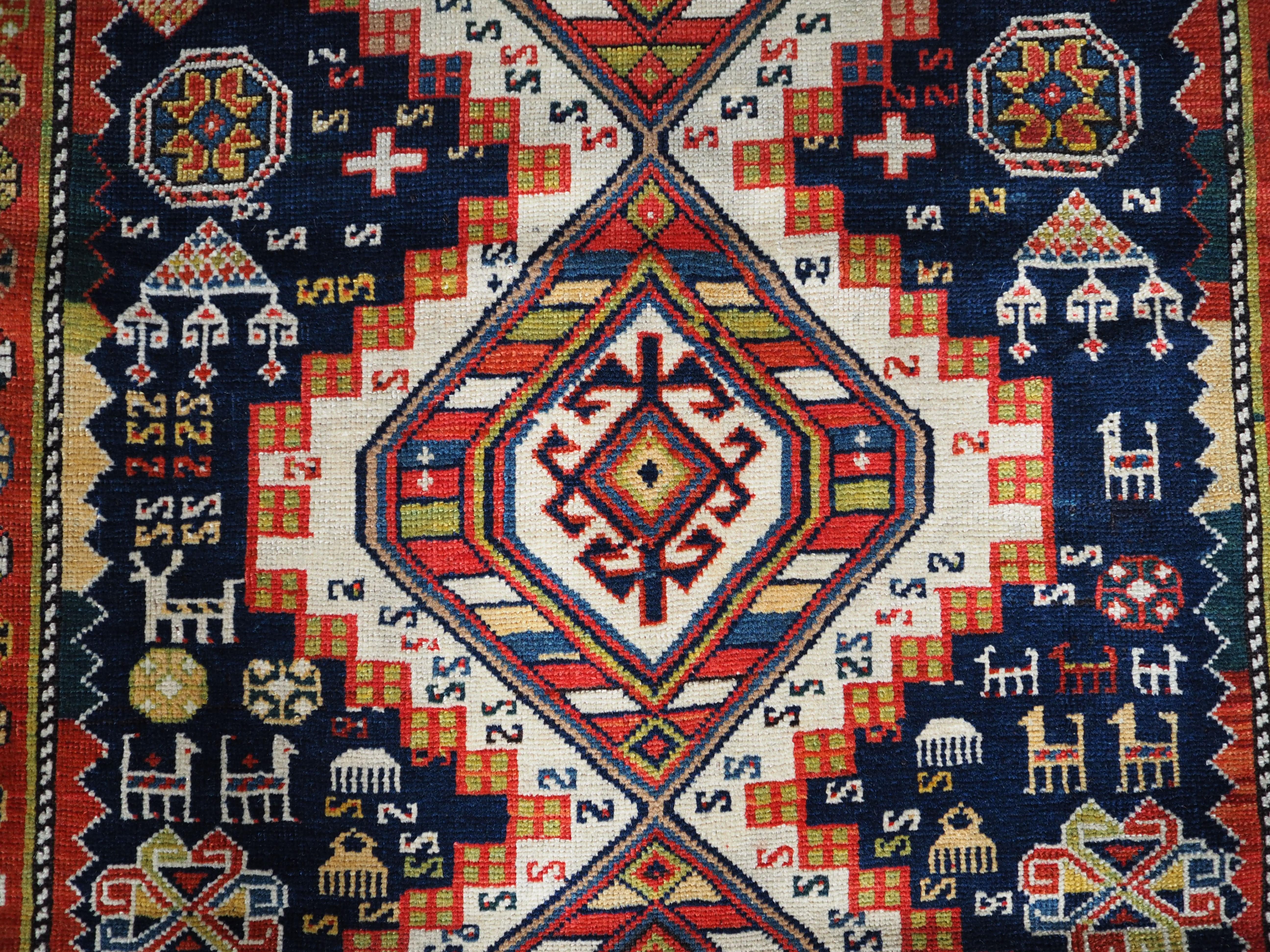 Wool Antique Caucasian Shirvan Rug of Classic Linked Medallion Design For Sale