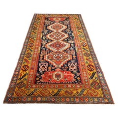 Tapis Shirvan caucasien ancien de style classique à médaillons reliés entre eux