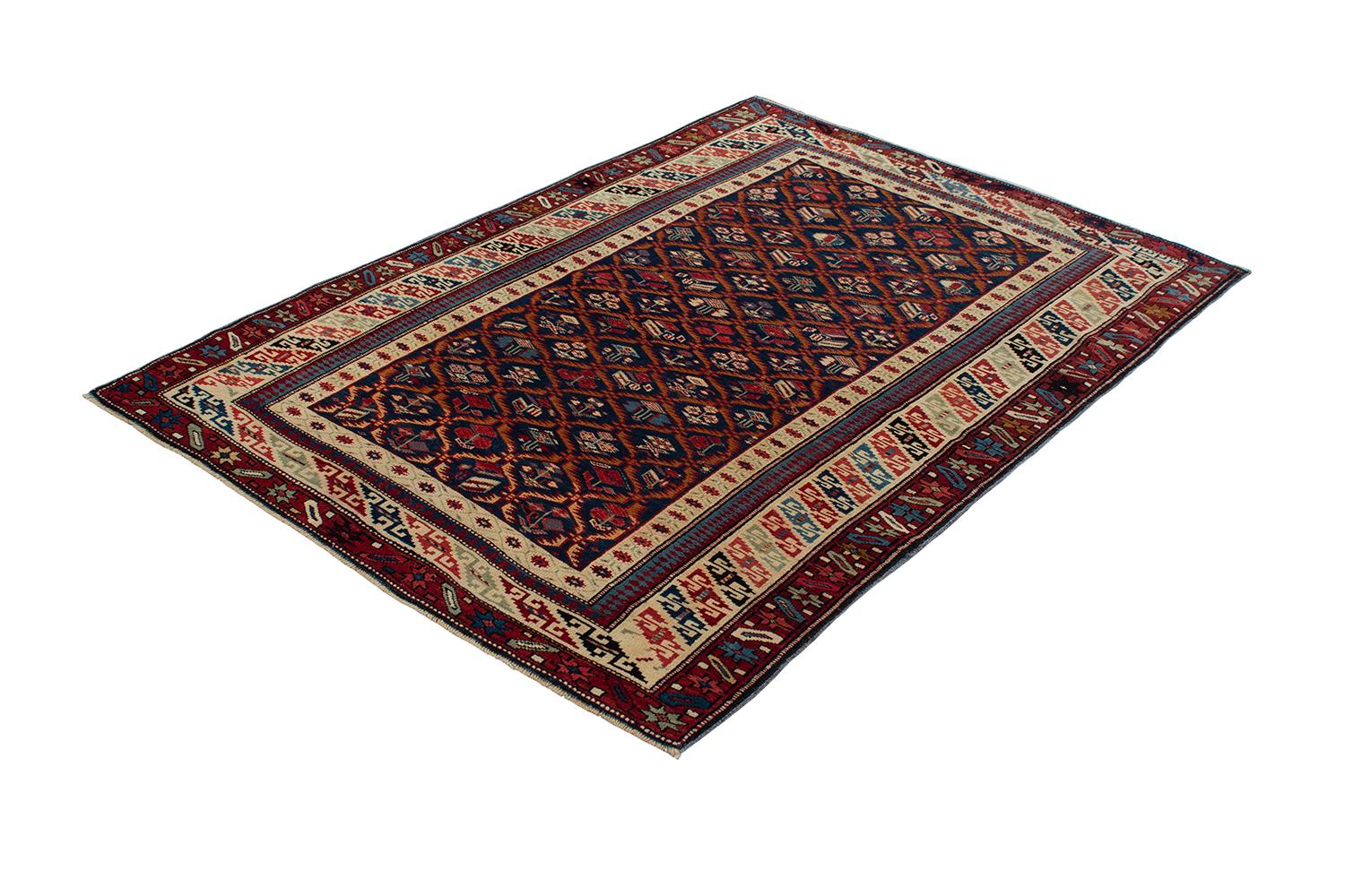 Hand-Knotted Antique Caucasian Shirvan Rug with a Navy Background For Sale