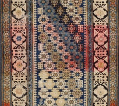 Antique Caucasian Shirvan Rug with All-Over Blossoming Tribal Motifs