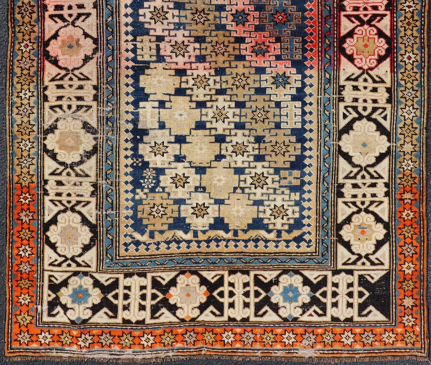Kazak Antique Caucasian Shirvan Rug with All-Over Blossoming Tribal Motifs For Sale
