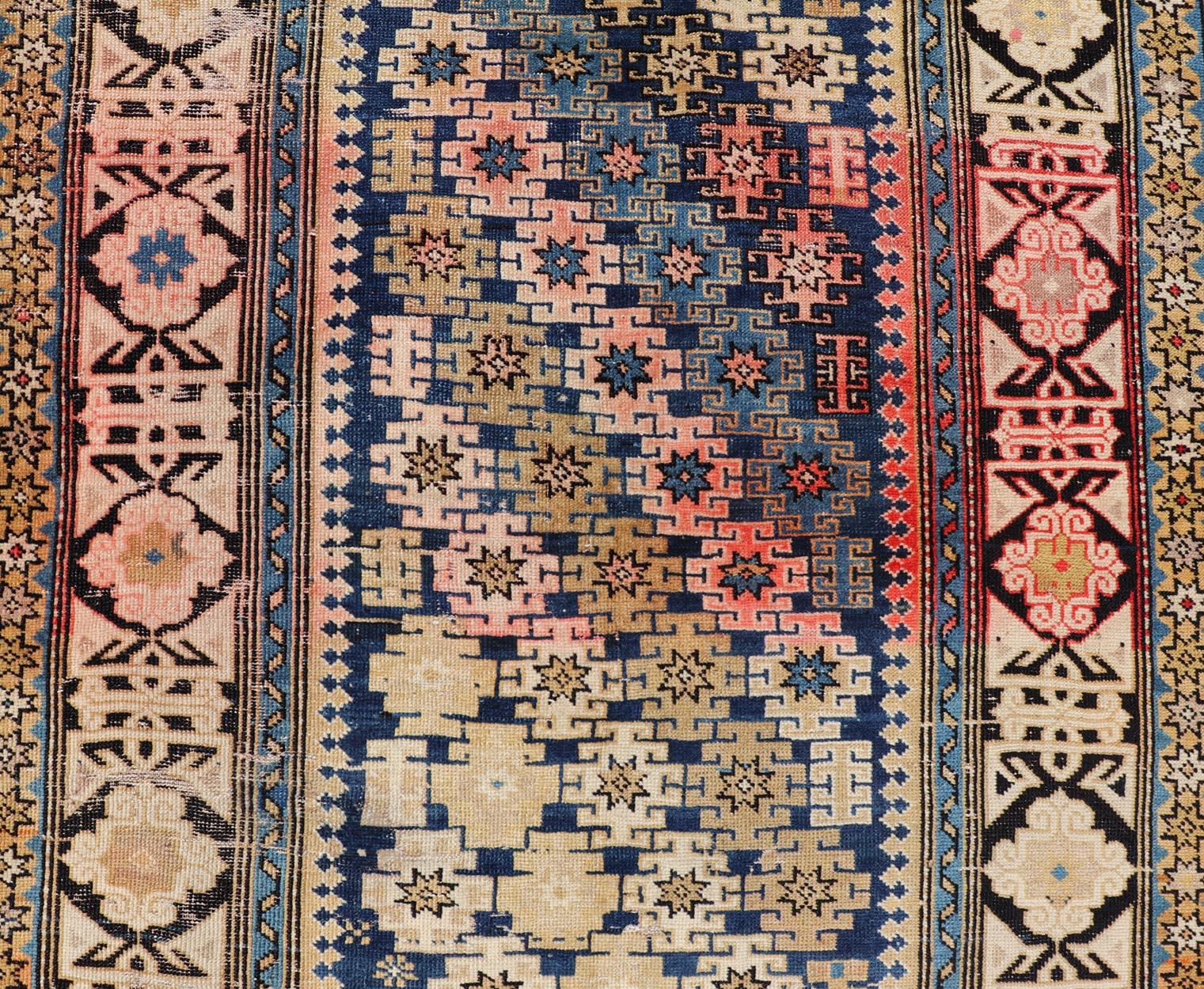 19th Century Antique Caucasian Shirvan Rug with All-Over Blossoming Tribal Motifs For Sale