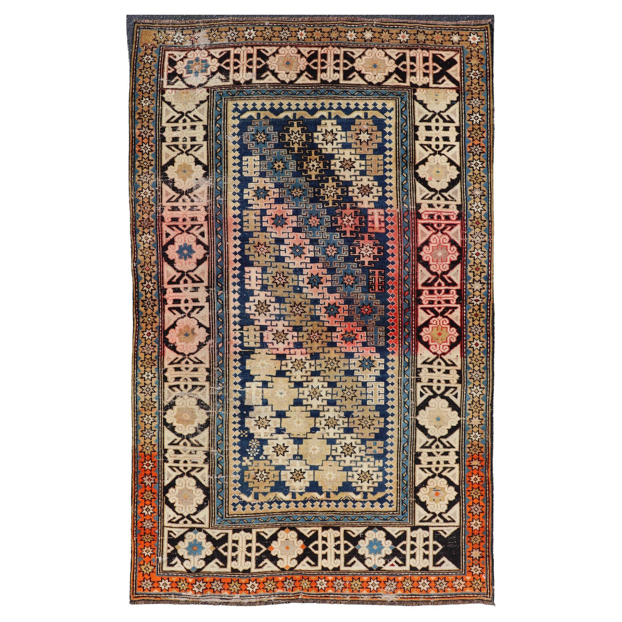 Antique Caucasian Shirvan Rug with All-Over Blossoming Tribal Motifs For Sale