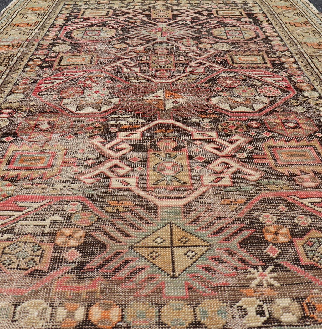 Antique Caucasian Shirvan Rug with All-Over Floral Motifs On A Brown Field. Keivan Woven Arts, Rug EMB-22185-15066, Antique Caucasian, Antique Shirvan Caucasus Early 20th Century
Measures: 3'3 x 5'2 
This colorful blossom Shirvan carpet features an