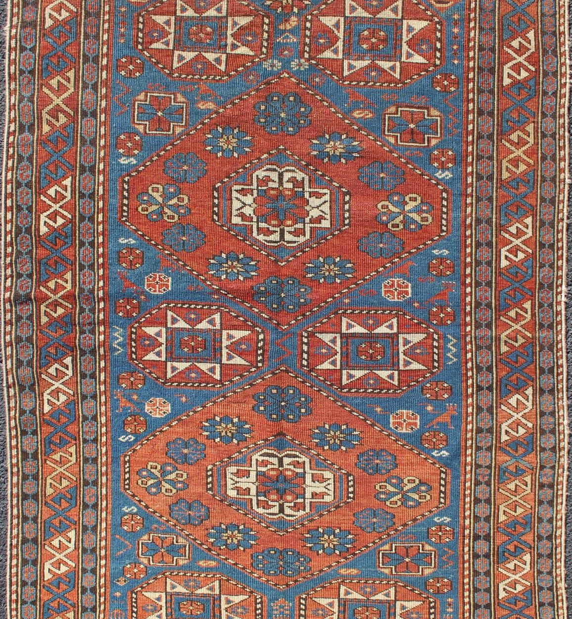  Antique Caucasian Shirvan Rug with Geometric Design in Brunt Orange and Blue. Keivan Woven Arts / rug M14-0905, country of origin / type: Caucus / Shirvan, circa 1890.
Measures: 3'6 x 5'1.
This stunning late 19th century antique Shirvan rug from