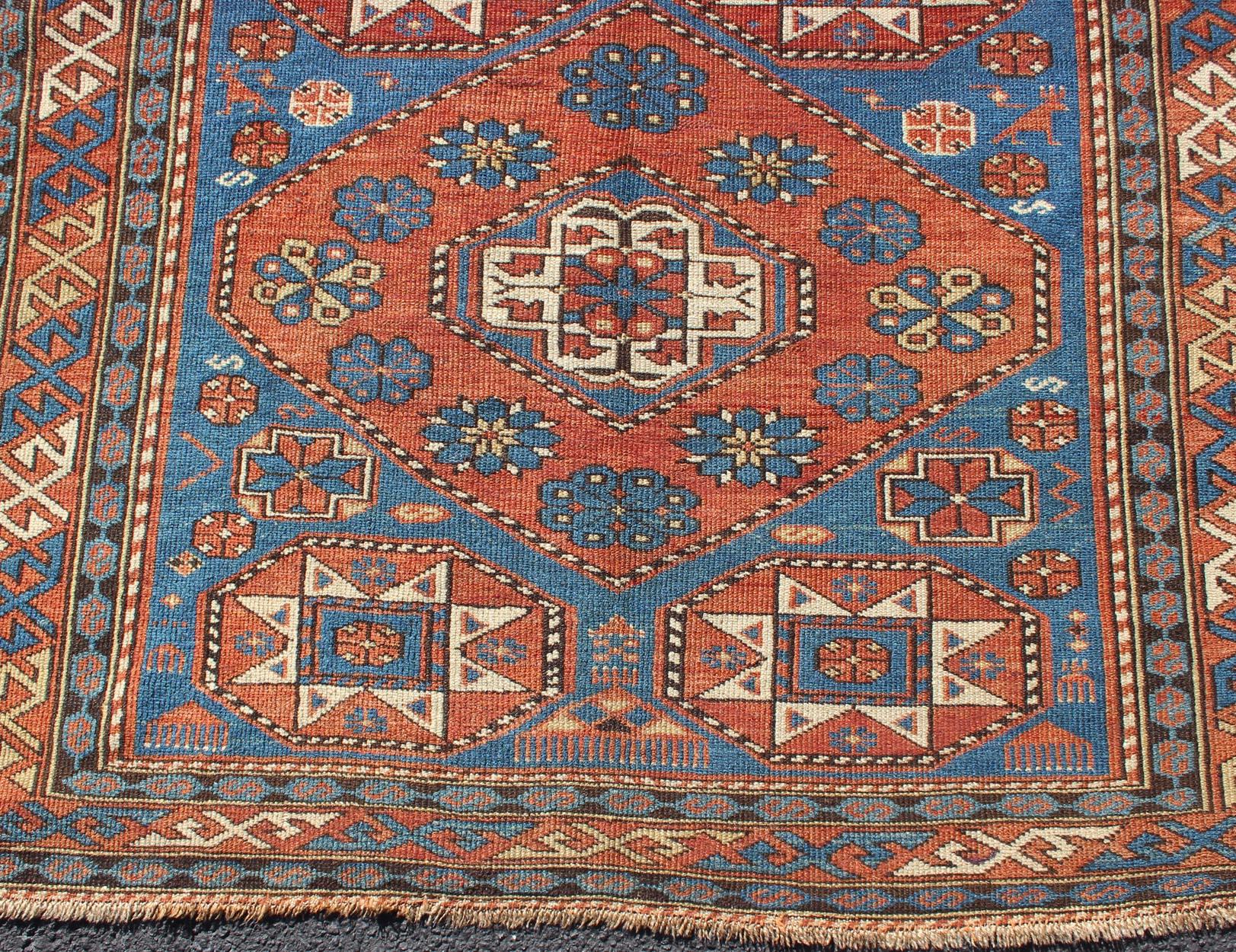 Late 19th Century  Antique Caucasian Shirvan Rug with Geometric Design in Brunt Orange and Blue  For Sale
