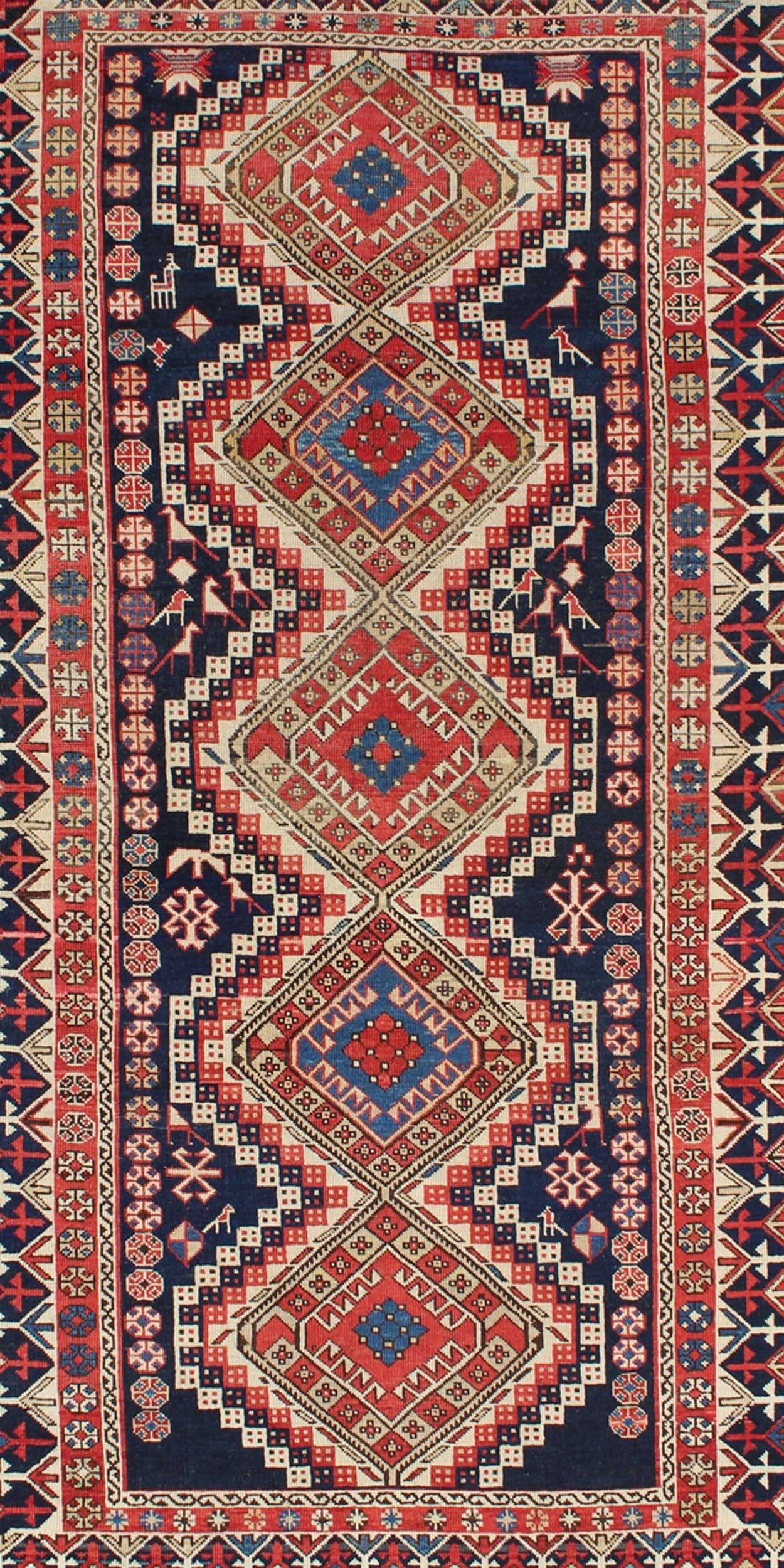 Kazak Antique Caucasian Shirvan Rug with Tribal Design and Medallions For Sale