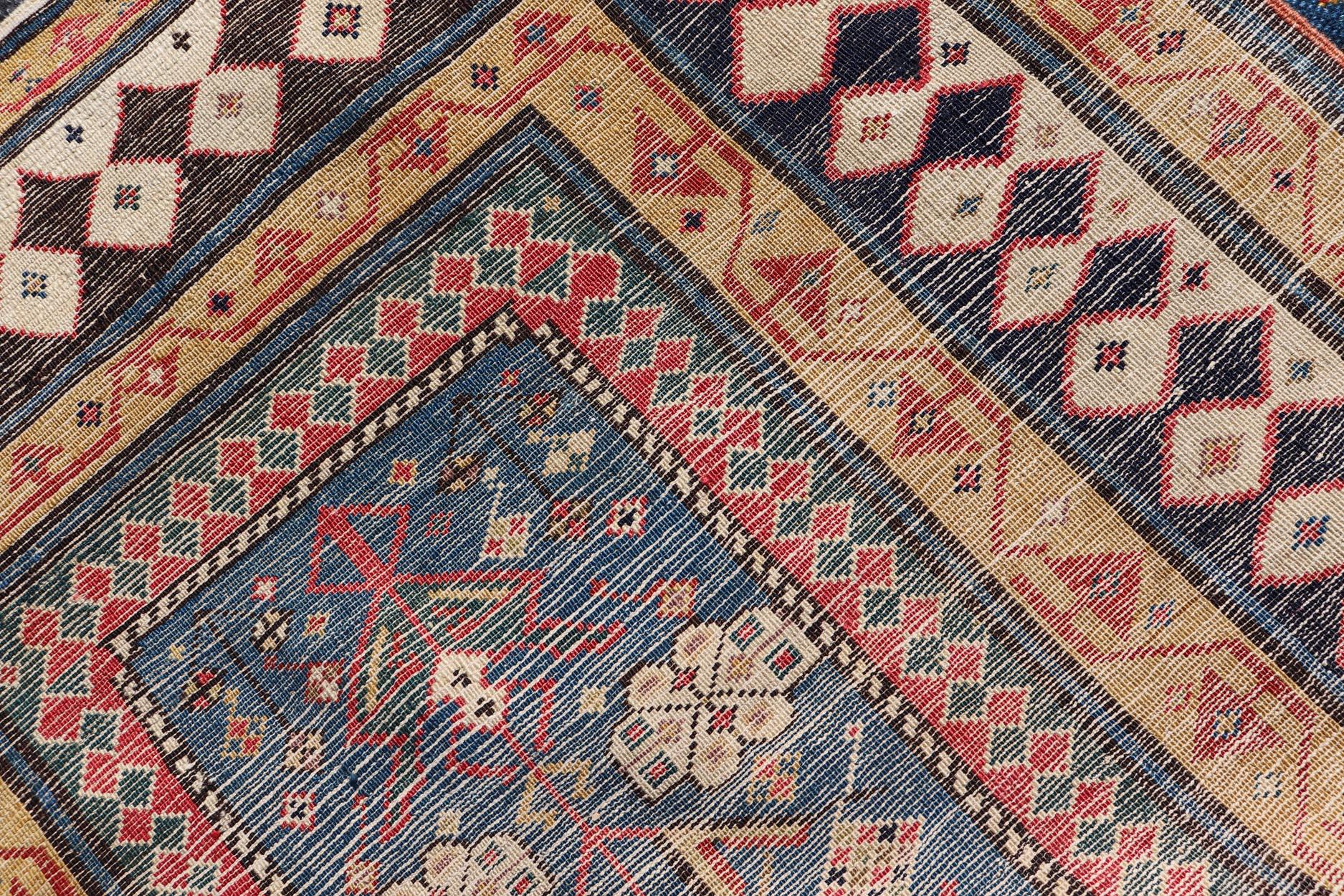 Antique Caucasian Shirvan Rug with Tribal Design and Motifs in Vivid Colors. Keivan Woven Arts / rug X23-0810-55, country of origin / type: Caucasus / Shirvan, circa 1875.
Measures: 3'9 x 7'10 
A finely woven Shirvan Caucasian rug. The field design
